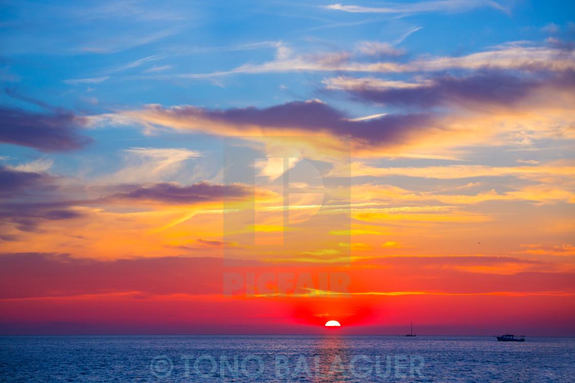 1120x747 Ibiza San Antonio magic sunset red sky clouds, download or print for £12.40
