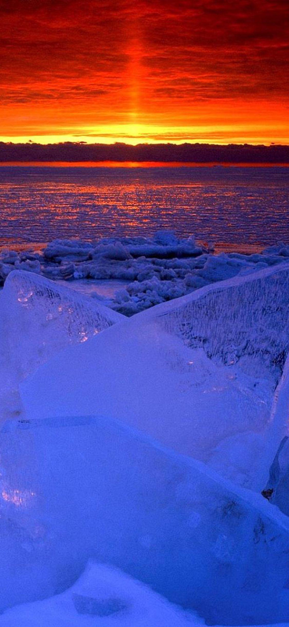 1125x2436 New York City iPhone X Wallpaper Awesome Nature Ocean Sunset Iceberg