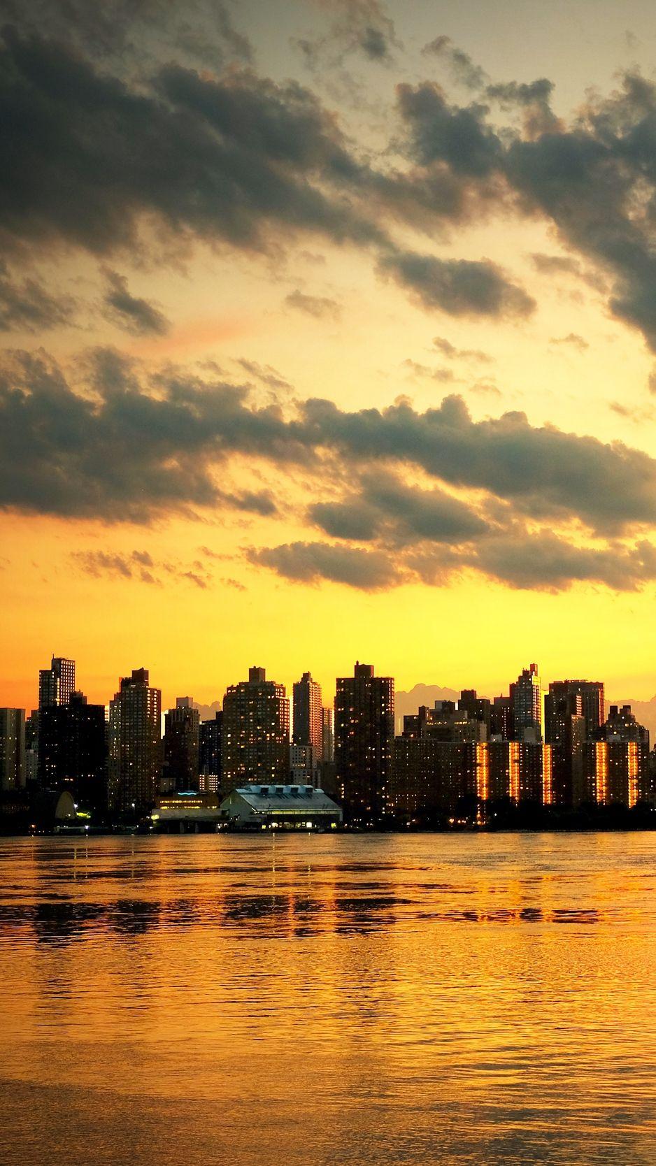 938x1668 Download wallpaper 938x1668 new york, sunset, skyscrapers, ocean