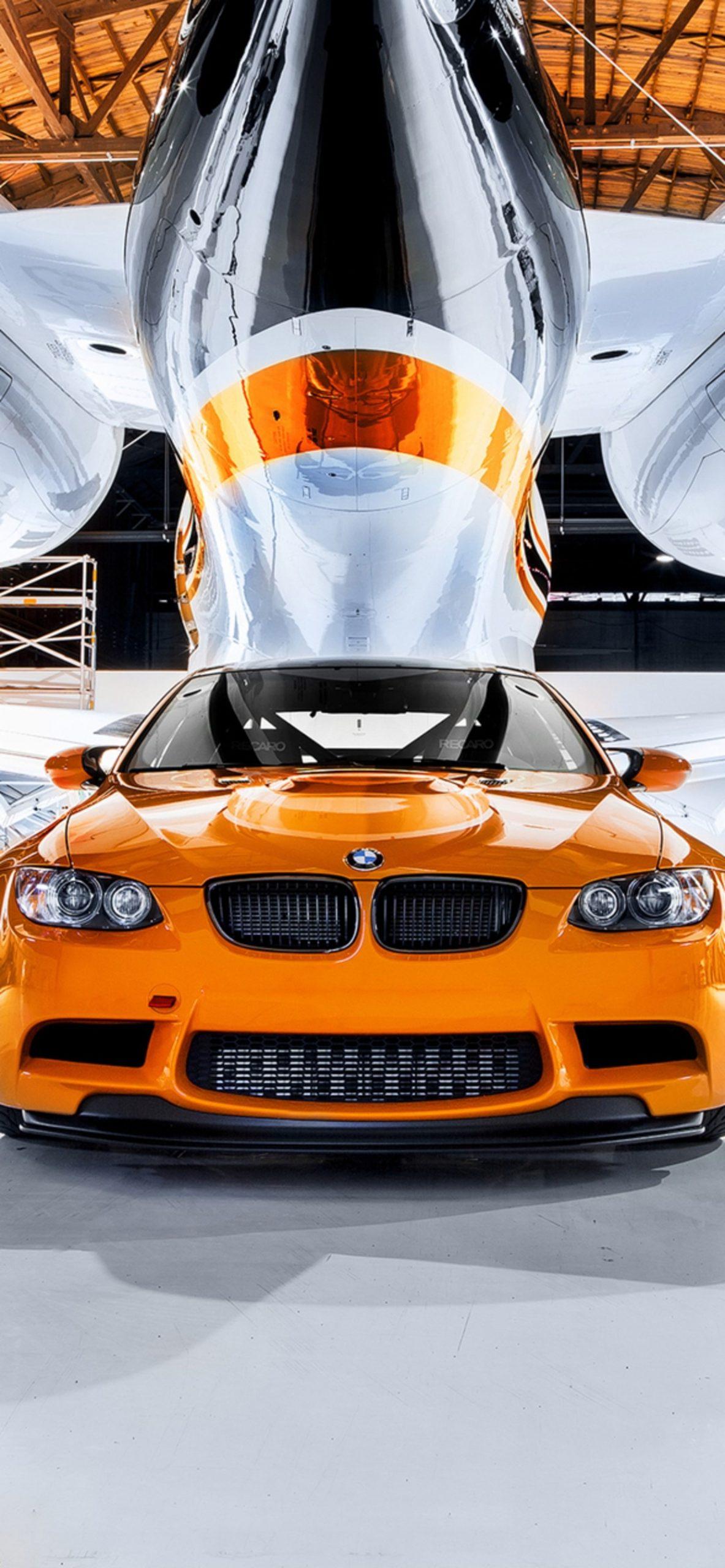1183x2560 Orange BMW Car and Plane HD 1242X2688 Android Wallpaper