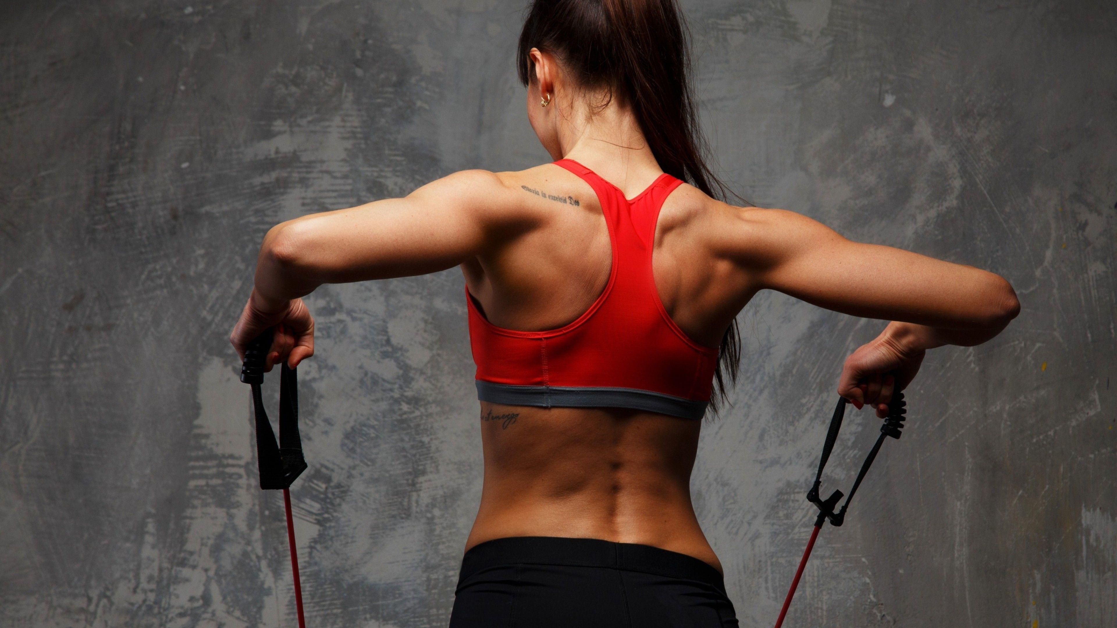 3840x2160 A Woman Working Out In The Gym Health HD Wallpaper 11