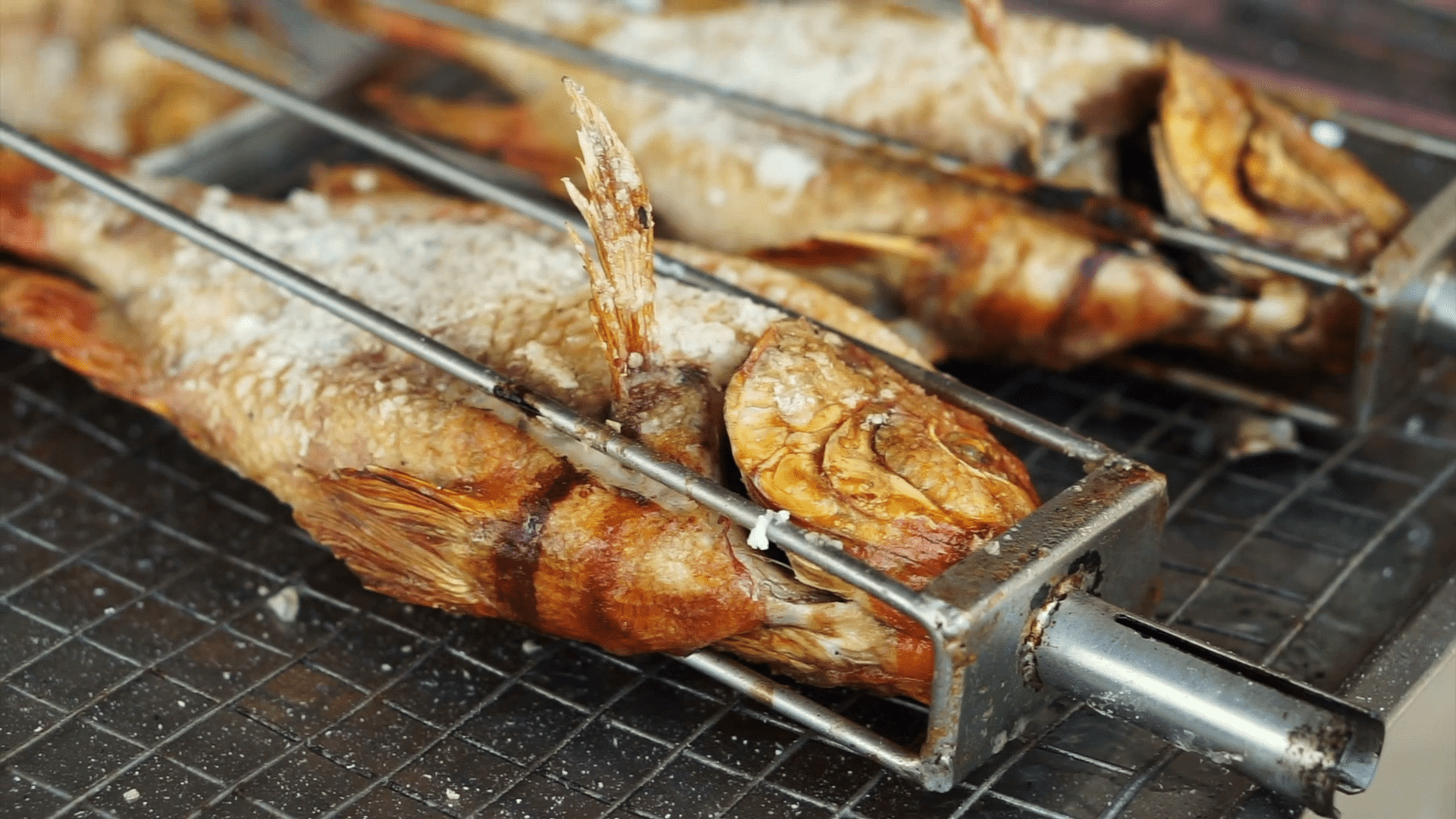 1920x1080 Whole fish roasting machine, red fish grill with charcoal Stock Video Footage