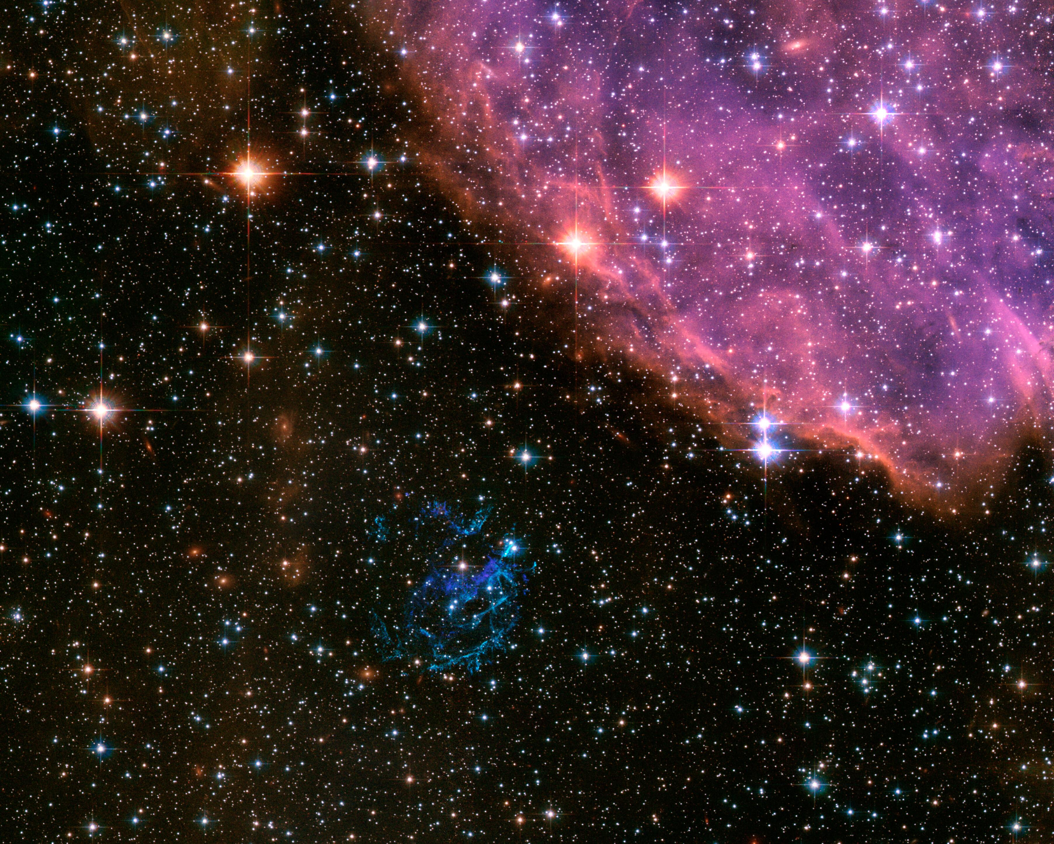 3609x2891 Hubble's Distant View Of The Supernova Remnant 1E 0102.2 7219. ESA/ Hubble
