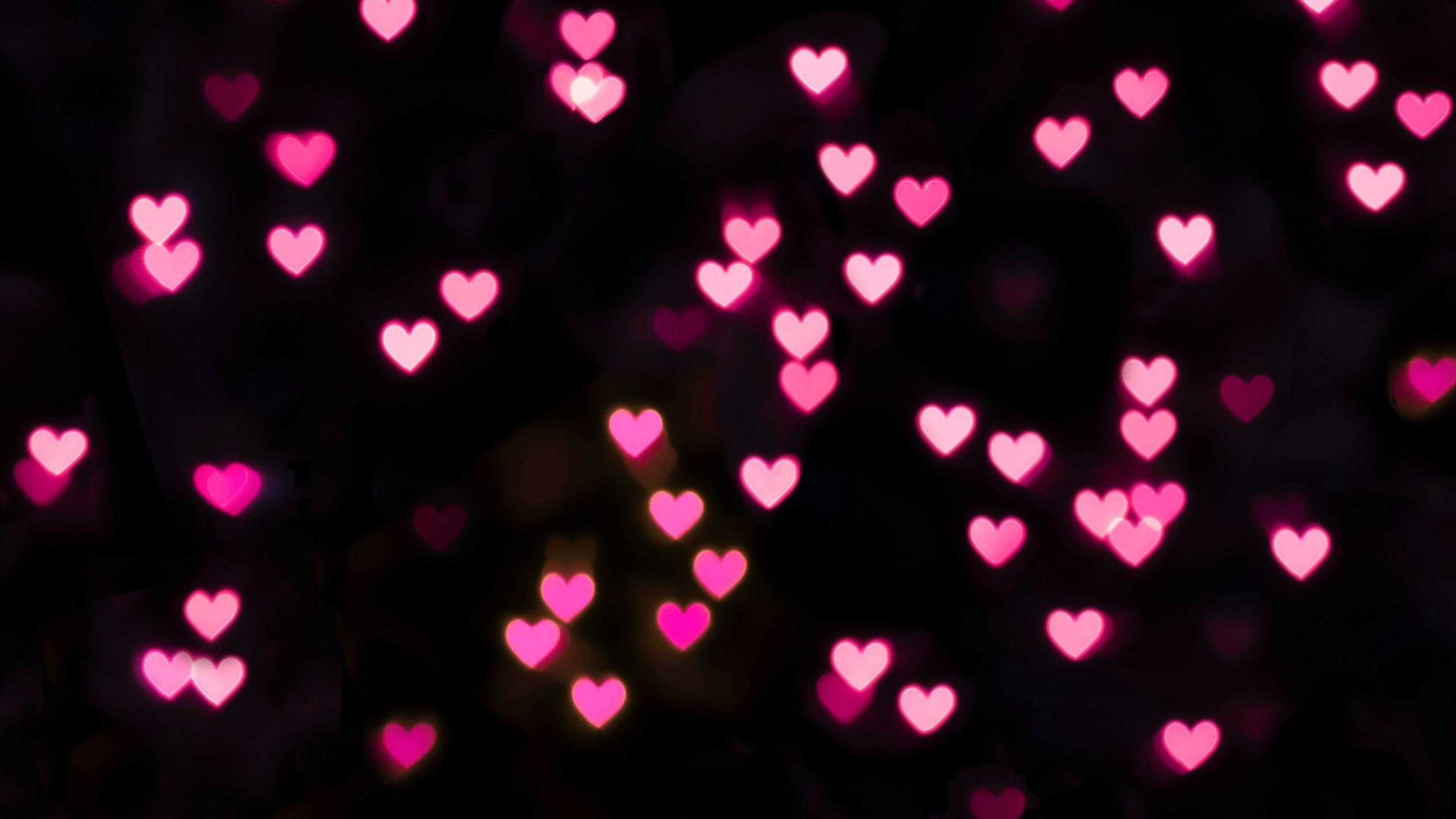 2560x1440 Pink hearts Wallpaper 4K, Illuminated, Black background