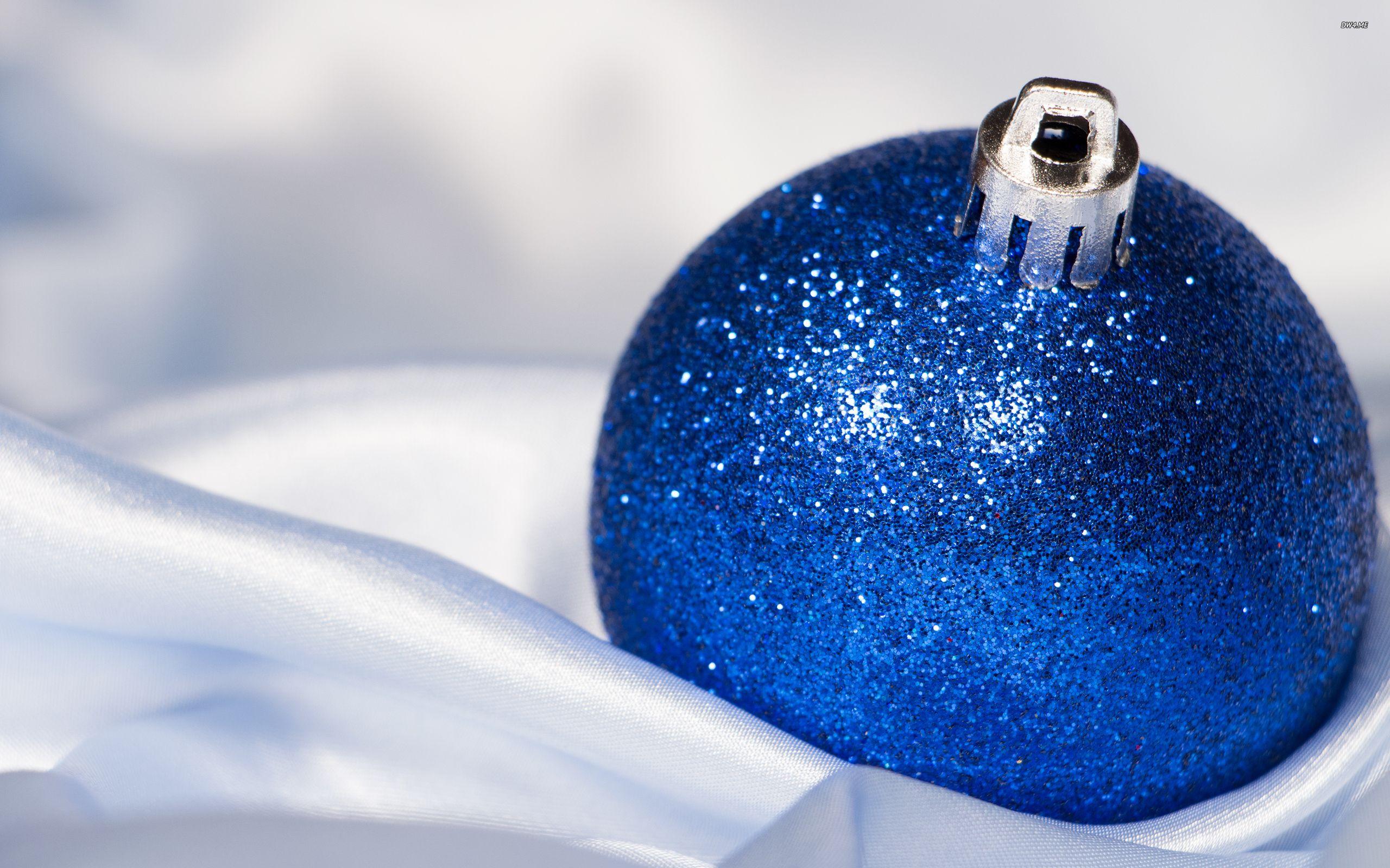 2560x1600 Sparkly blue Christmas bauble in silk wallpaper wallpaper