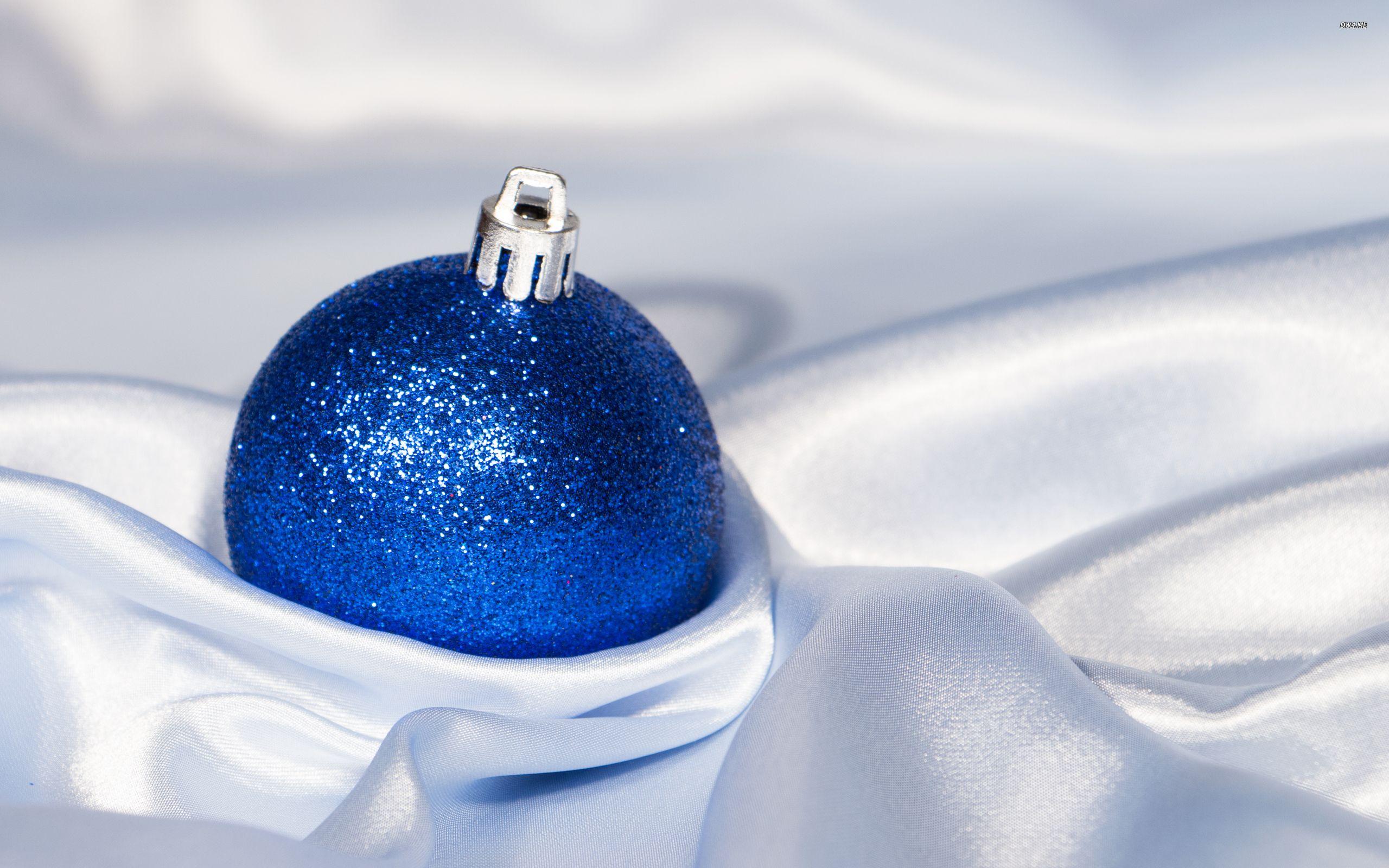 2560x1600 Blue Christmas bauble in silk wallpaper wallpaper