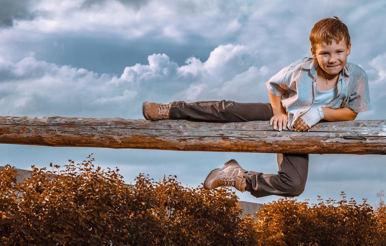 1332x850 Wallpaper the sky, clouds, boy, log, the bushes, child, ginger, naughty, Andrey Bortnikov image for desktop, section настроения