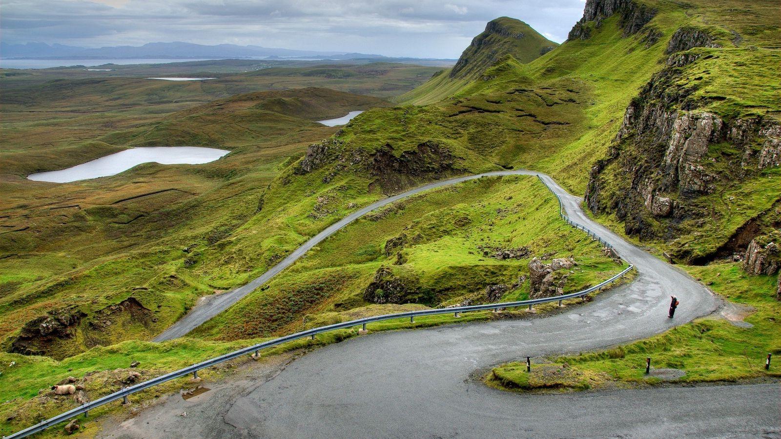 1600x900 Download wallpaper 1600x900 mountains, scotland, road, bends, person widescreen 16:9 HD background