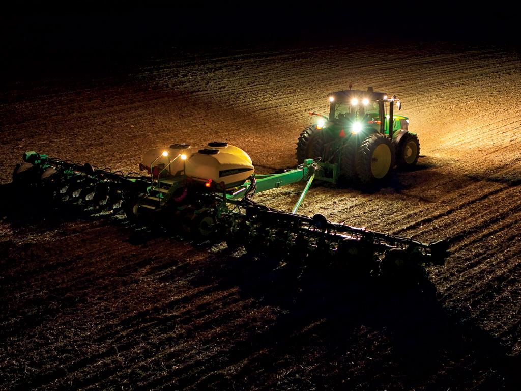 1024x768 John Deere Tractor At Night