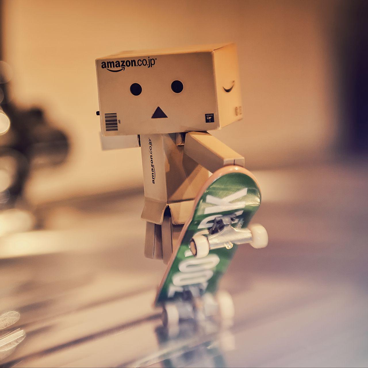 1280x1280 Download wallpaper 1280x1280 danbo, cardboard robot, skateboard, blur ipad, ipad ipad mini for parallax HD background