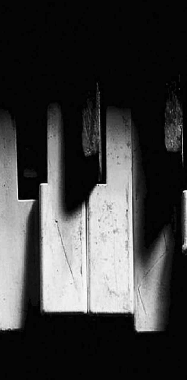 630x1280 Broken Piano Keys wallpaper