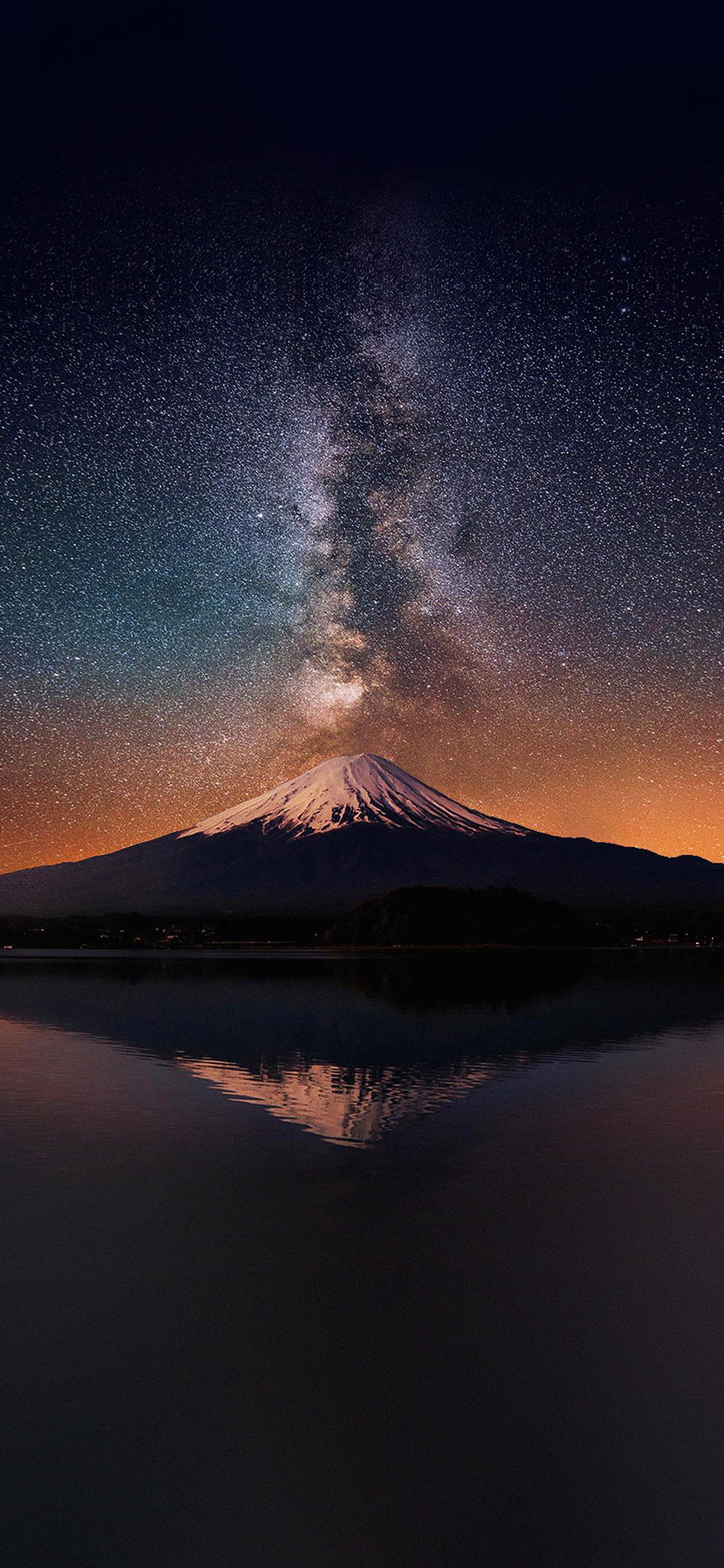 1125x2436 iPhoneXpapers milky way on mountain fuji sky
