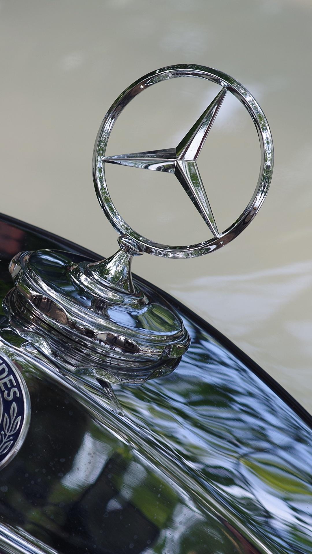 1080x1920 Desktop Wallpaper Mercedes Benz Logo Emblem Hood Cars 1080x1920