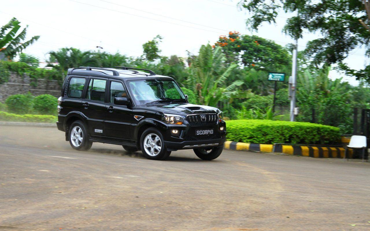 1280x800 Mahindra Scorpio Black Wallpaper. Mahindra scorpio black wallpaper, Black wallpaper, Beach background image