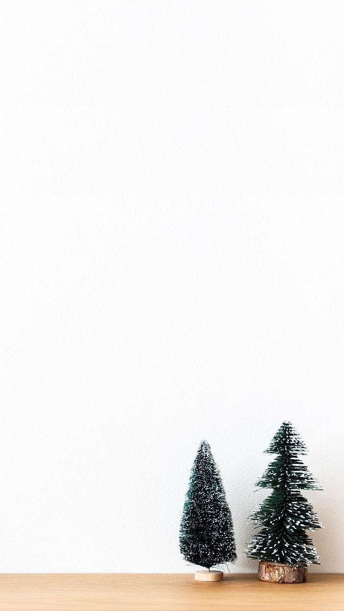 675x1200 Mini Christmas trees phone wallpaper