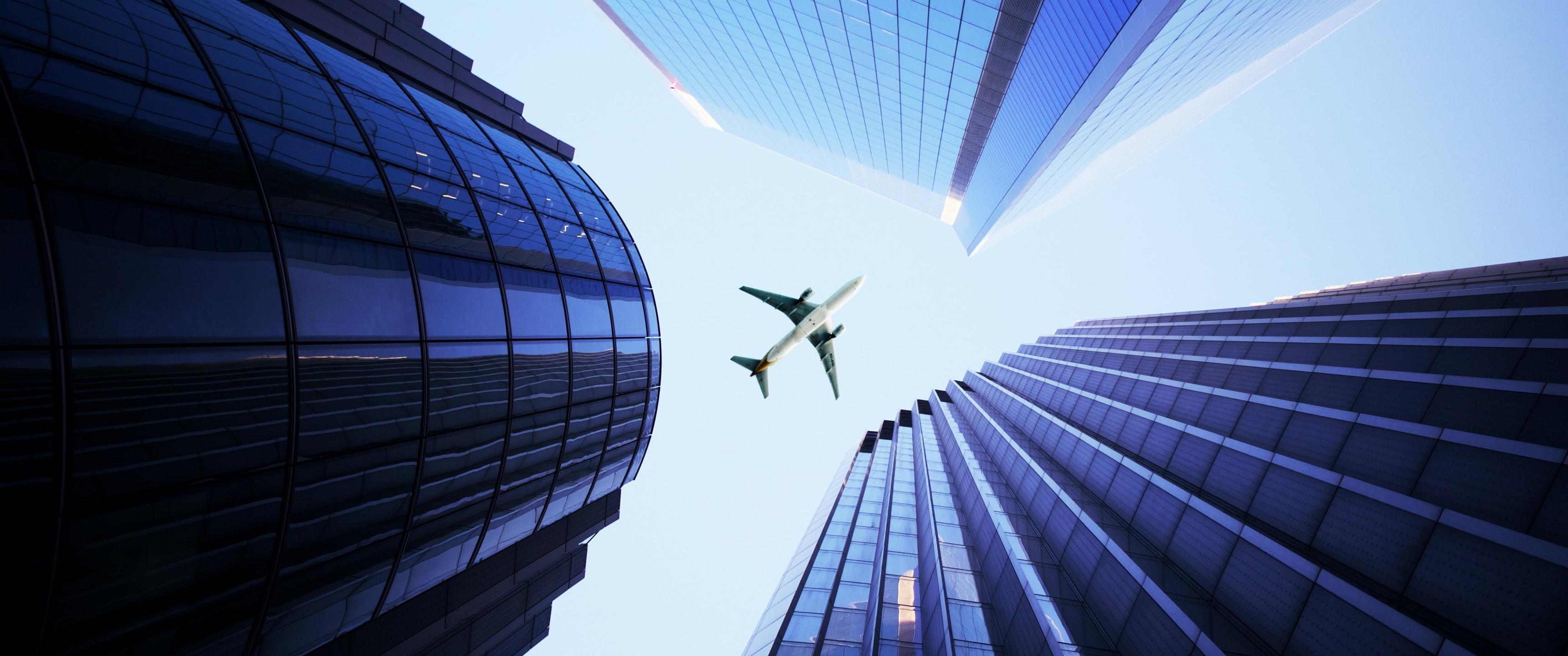 3440x1440 Airplane Wallpaper 4K, Looking up at Sky, Skyscrapers, Daytime, Photography