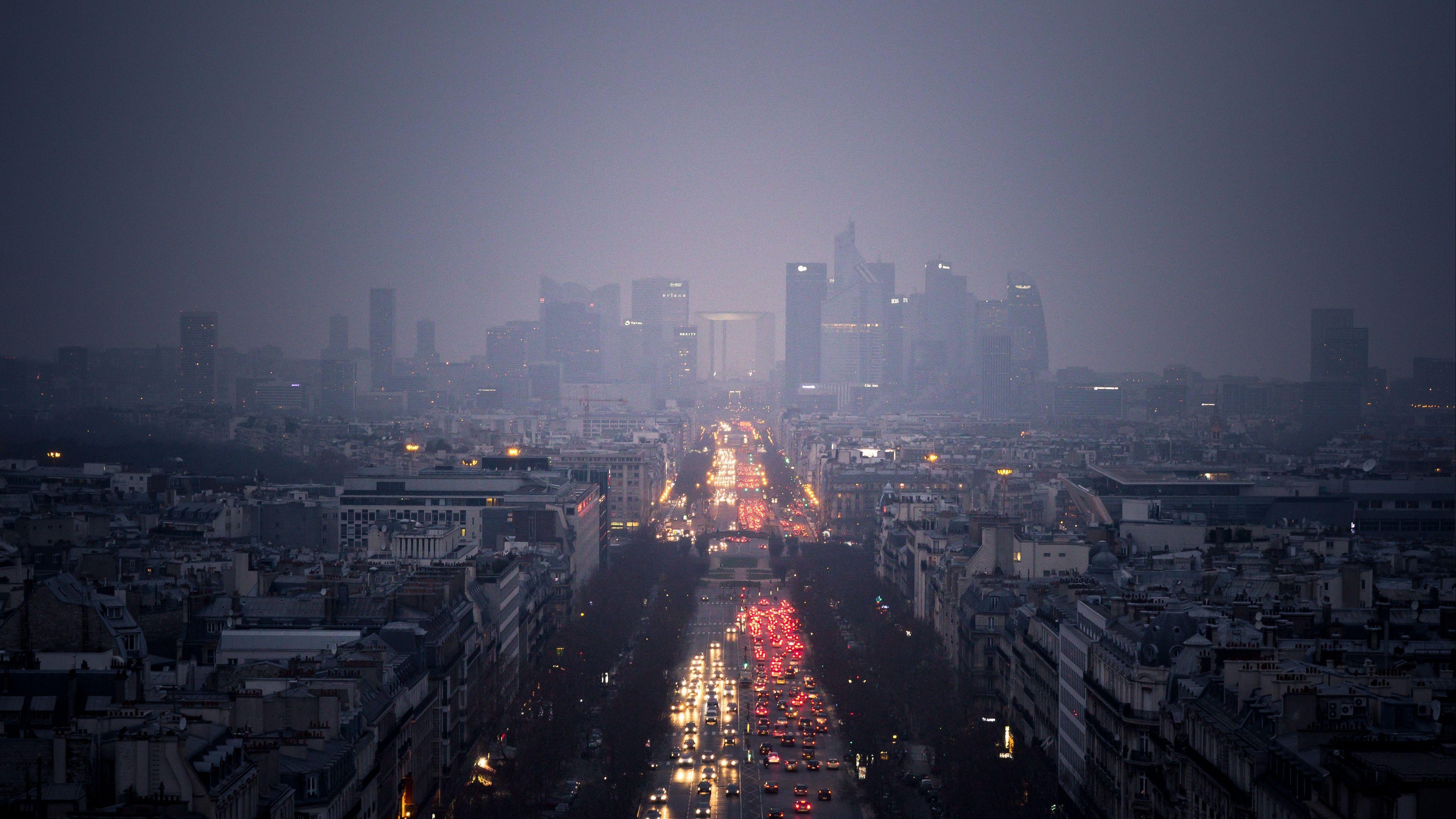 3840x2160 Download wallpaper 3840x2160 city, skyscrapers, clouds, rain, road