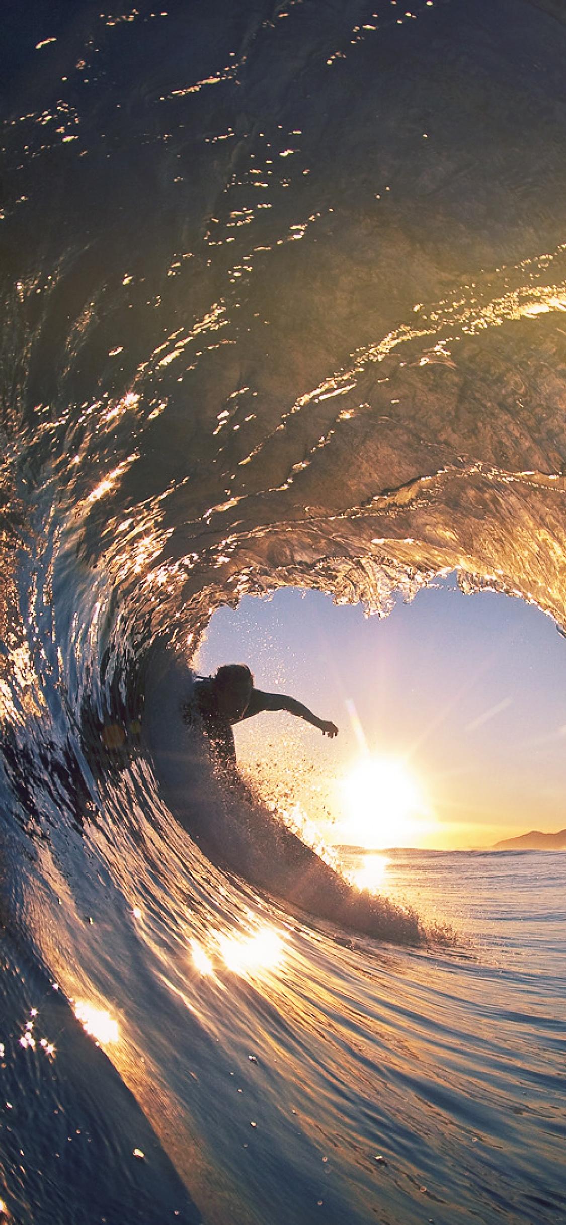 1125x2436 Surf Wave Sea Nature Sunshine Flare