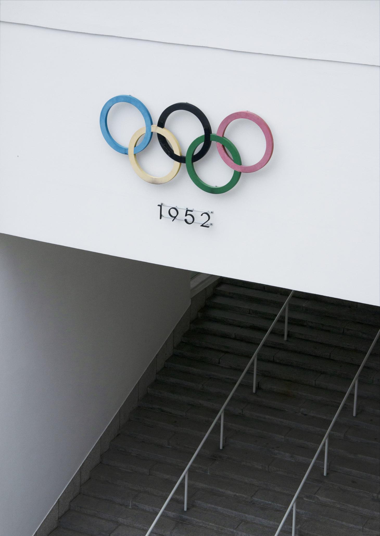 1460x2056 Modernist architecture of Helsinki Olympic stadium in photo. Wallpaper*