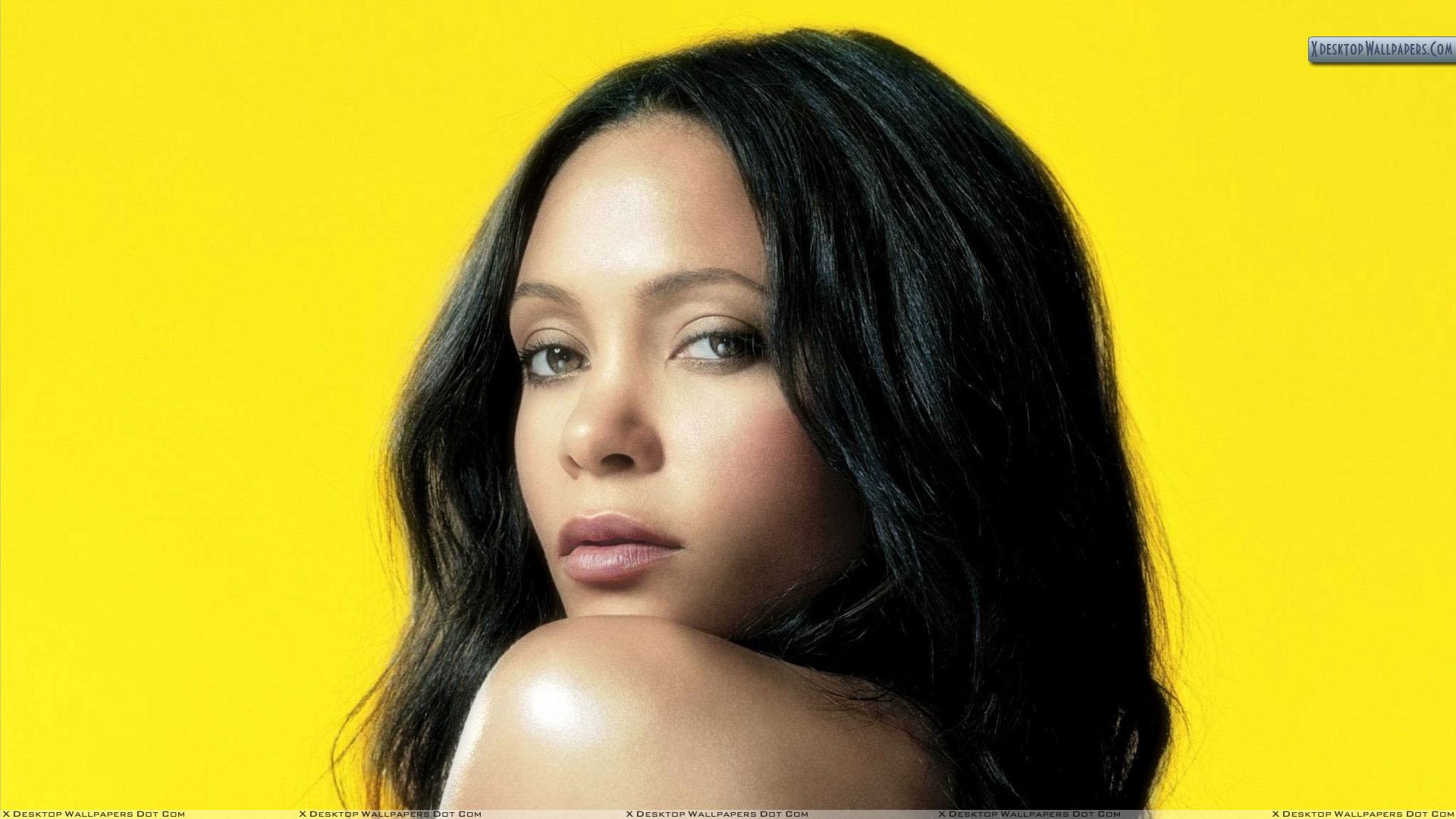 1920x1080 Thandie Newton Side Face Closeup And Yellow Background Wallpaper