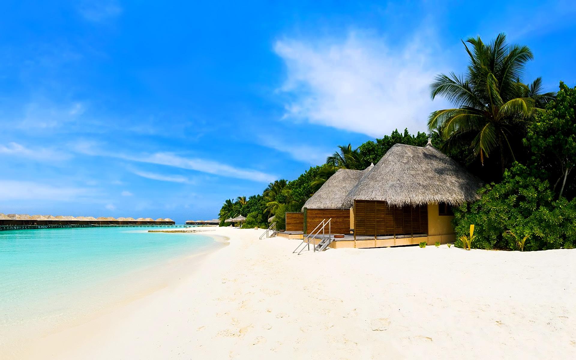 1920x1200 Beach bungalows on the tropical island wallpaper