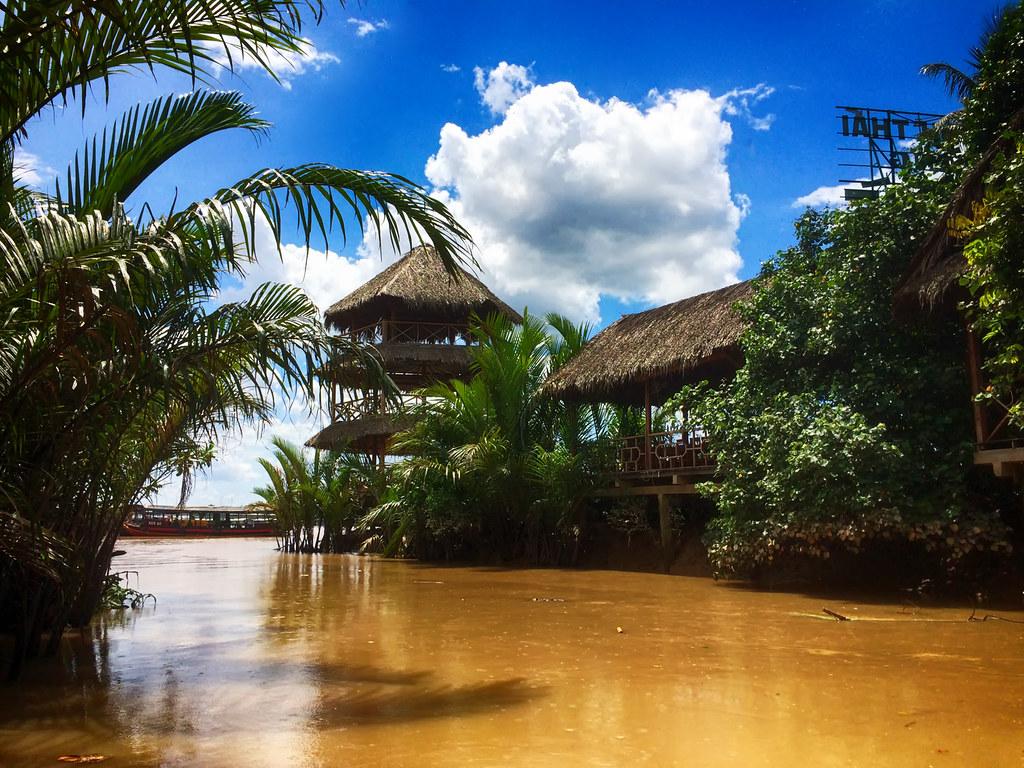 1024x768 Boating down the Mekong Delta in Vietnam. A boat ride down