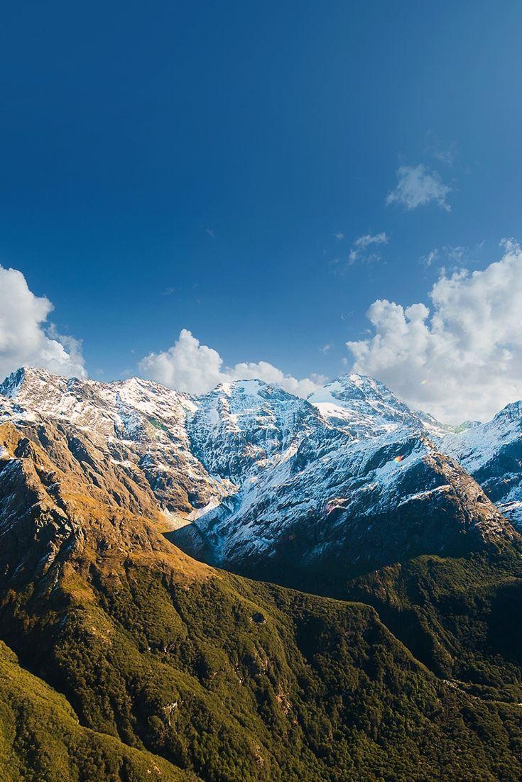 735x1102 Download Mountain View On Bright Day Wallpaper