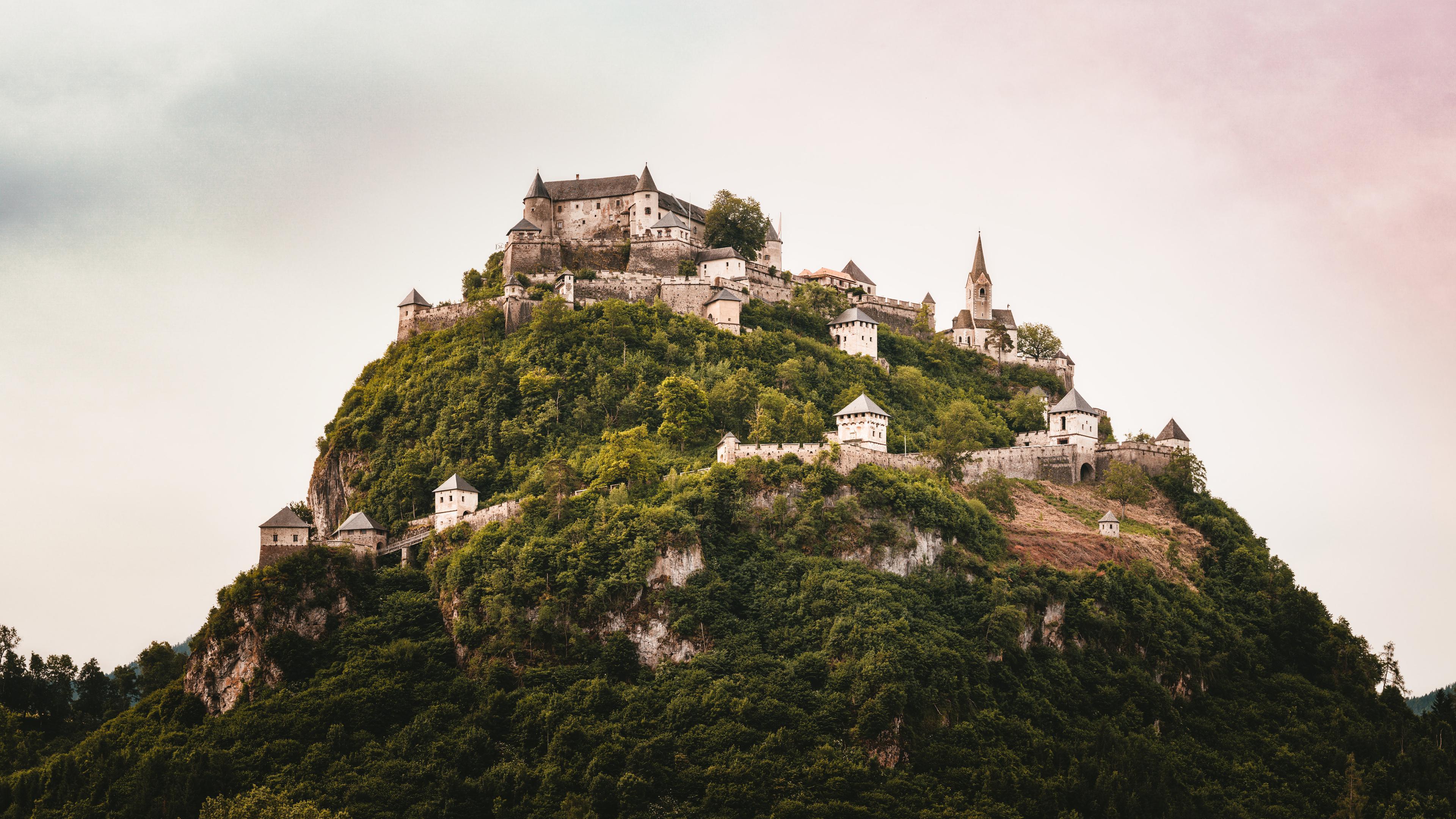 3840x2160 A Beautiful Castle Built On Top Of A Mountain 4K wallpaper