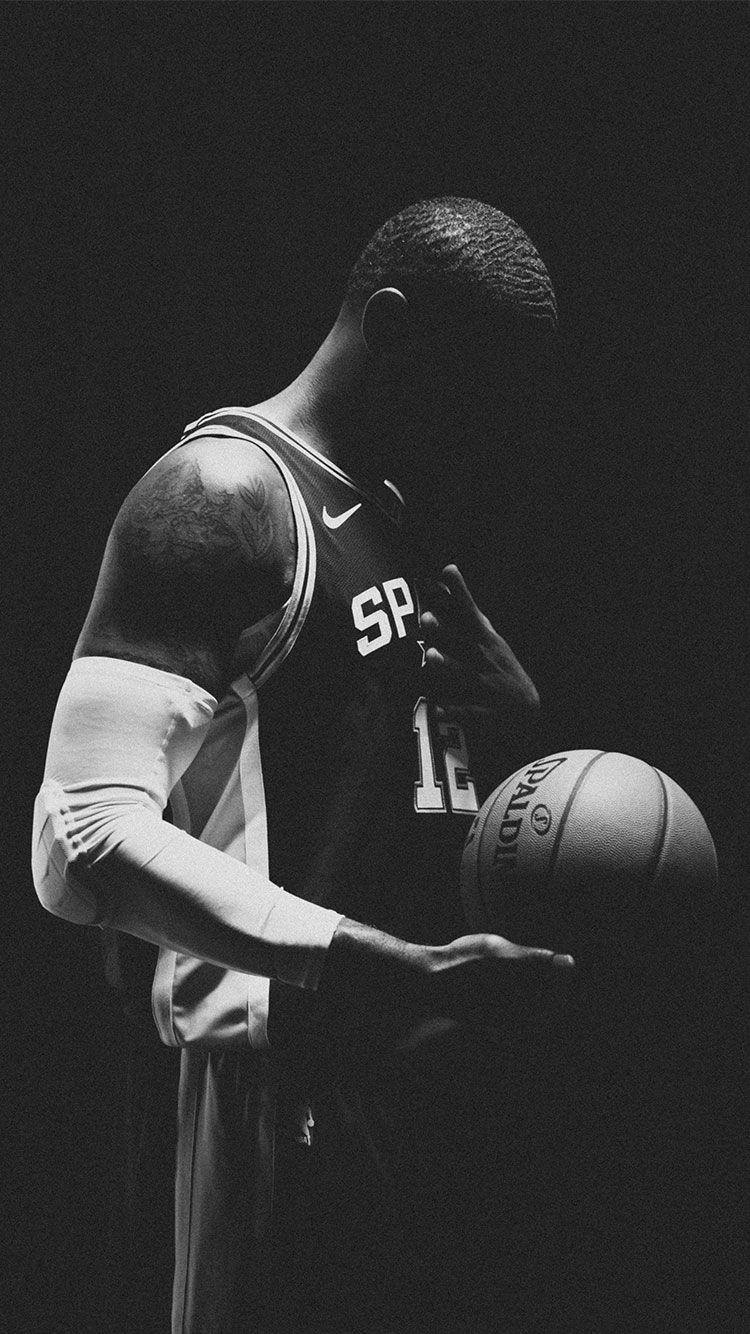 750x1334 Black Basketball Player Wallpaper