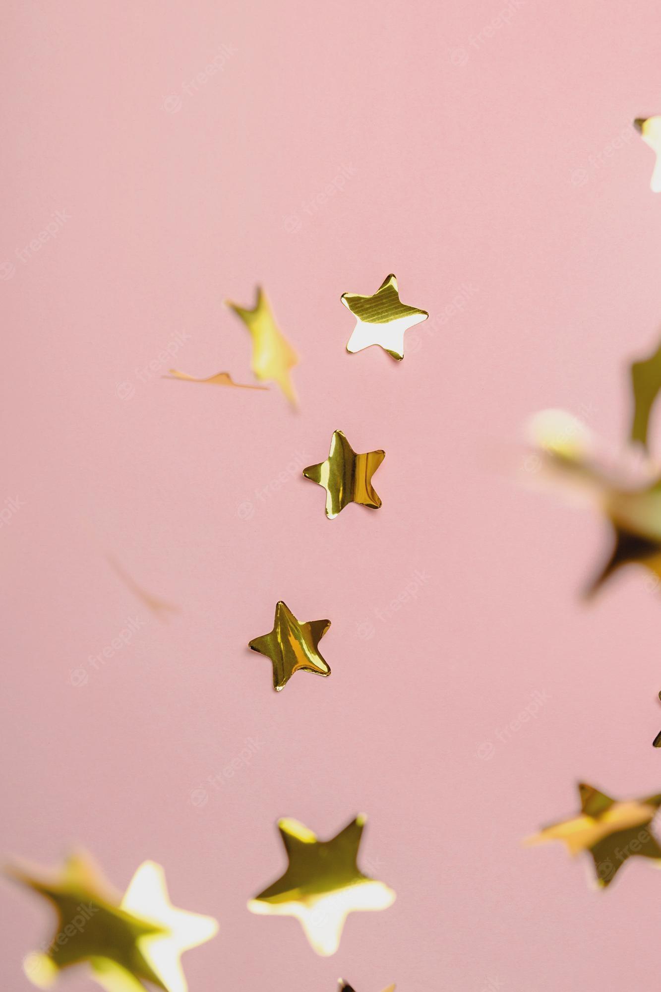 1333x2000 Premium Photo. Background with flying gold confetti stars pink background wallpaper