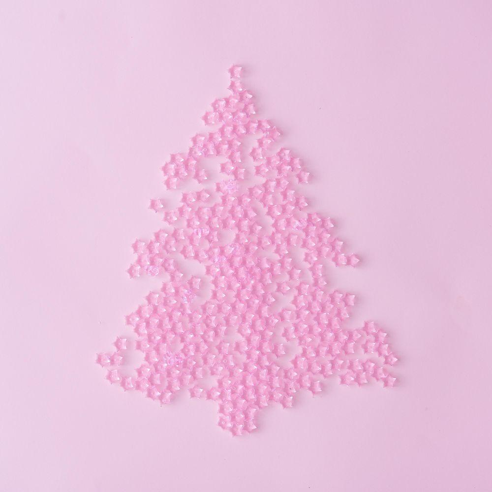 1000x1000 Christmas tree made of pink star decoration on pastel pink background