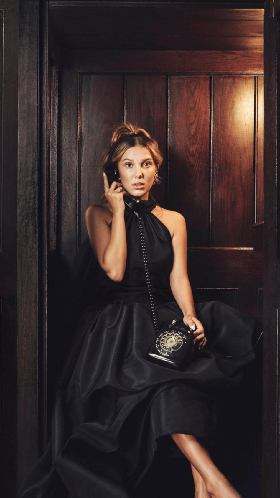 950x1689 Millie Bobby Brown Black Dress Telephone 4K Ultra HD Mobile Wallpaper