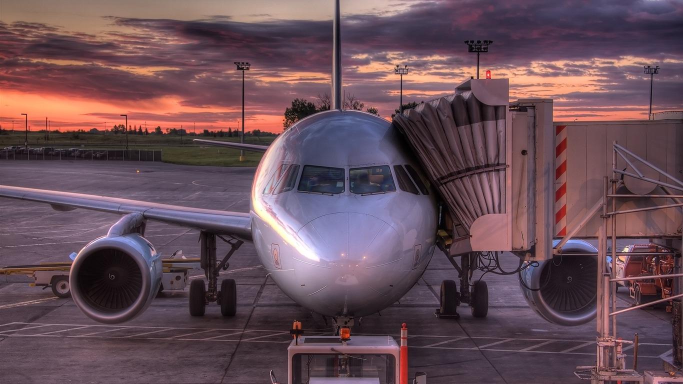 1366x768 Boarding A Plane Civil Aviation Aircraft Desktop Wallpaper
