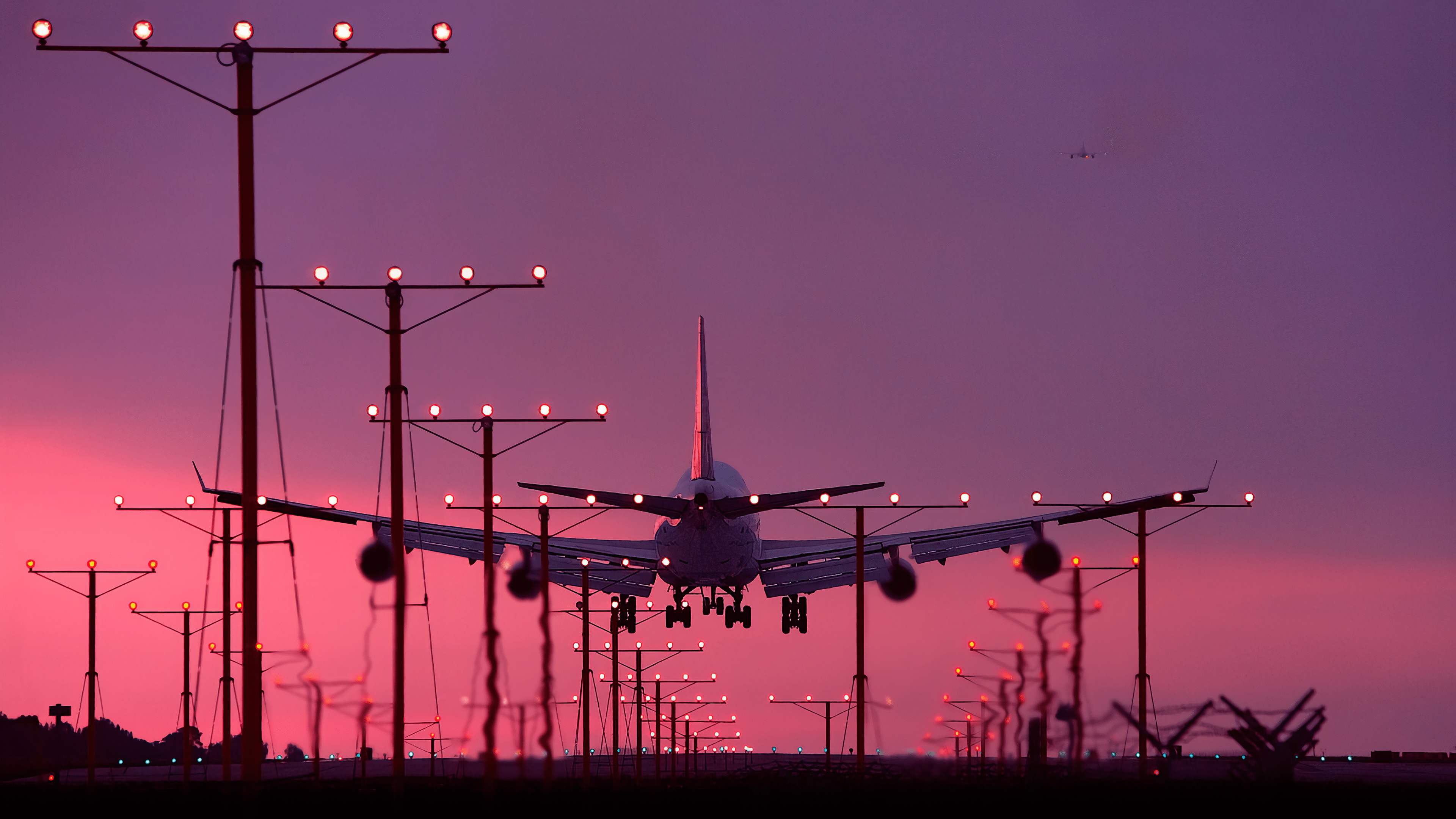 3840x2160 Sunset Landing: 4K Ultra HD Airplane
