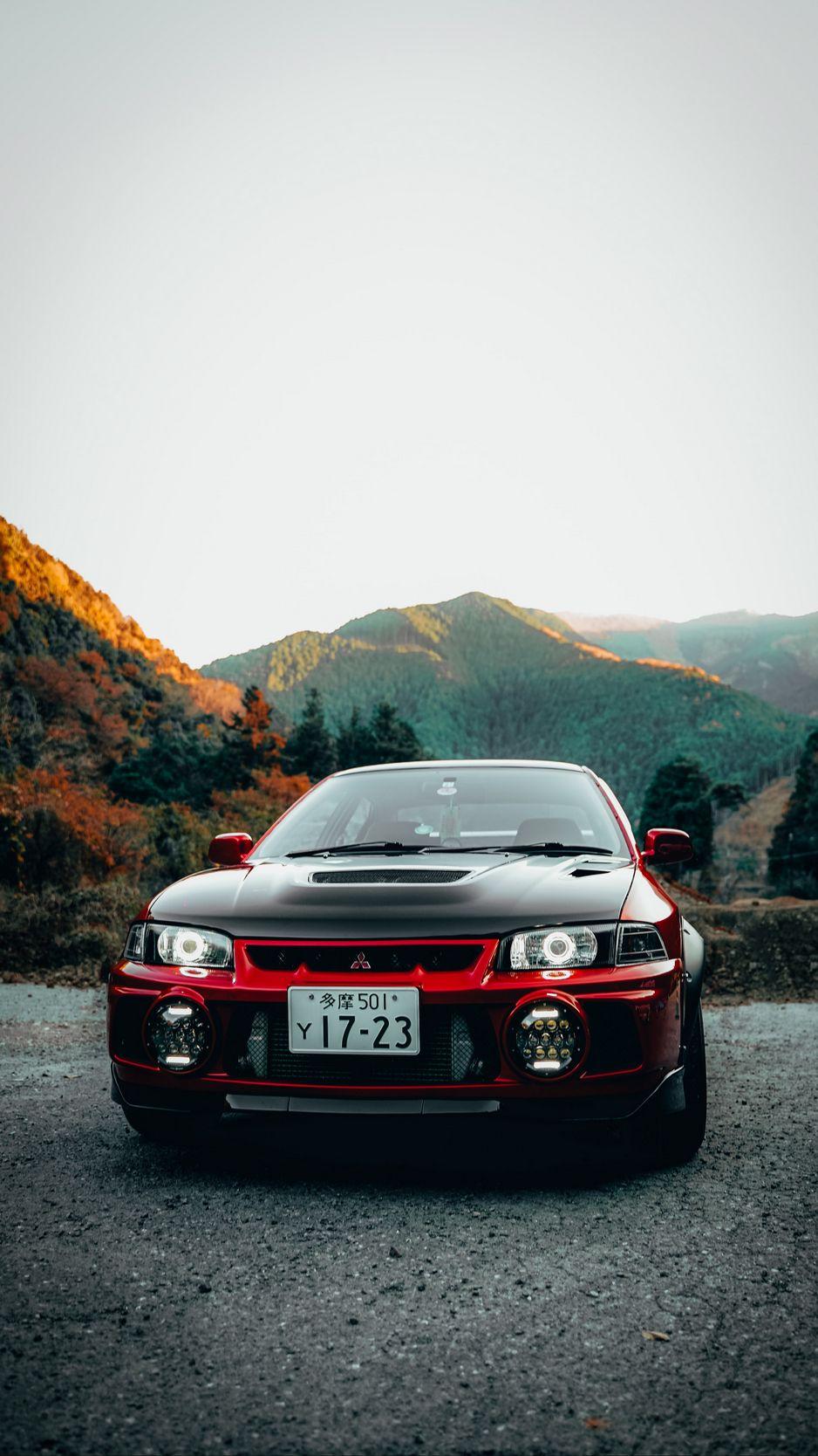 938x1668 Download Wallpaper 938x1668 Mitsubishi Lancer Evolution, Mitsubishi, Car, Red, Black, Front View Iphone 8 7 6s 6 For Parallax HD Background