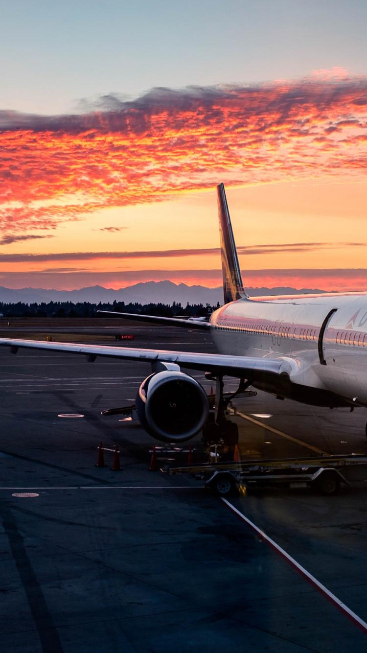 750x1334 Download wallpaper: Airplane on SEATAC International Airport 750x1334