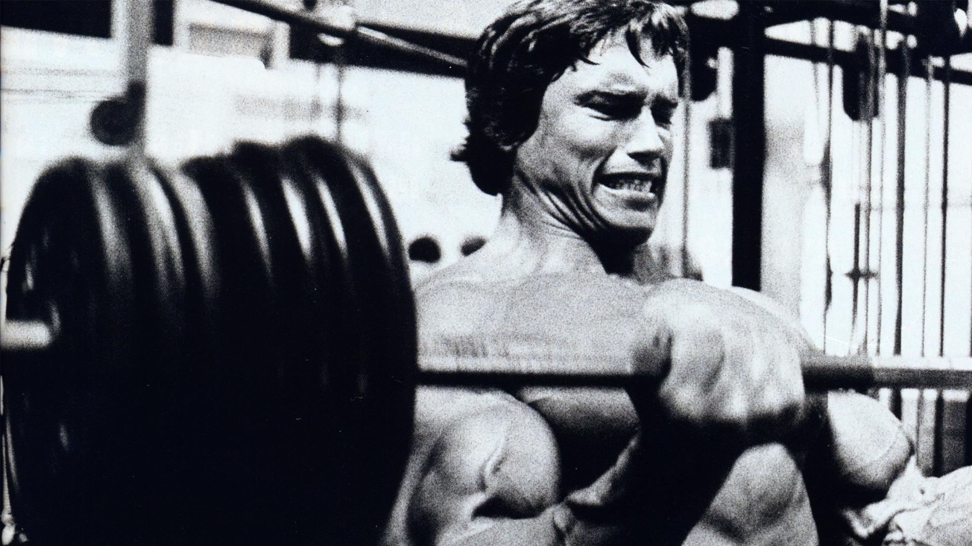 1920x1080 Arnold showing off his muscles