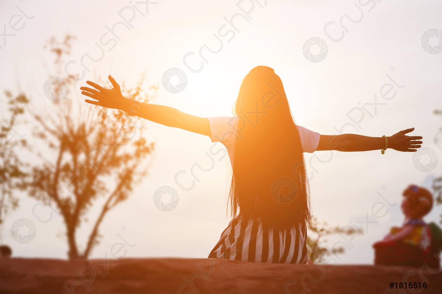 1500x1000 Sad young girl sitting alone on a grass outdoors, Sadness