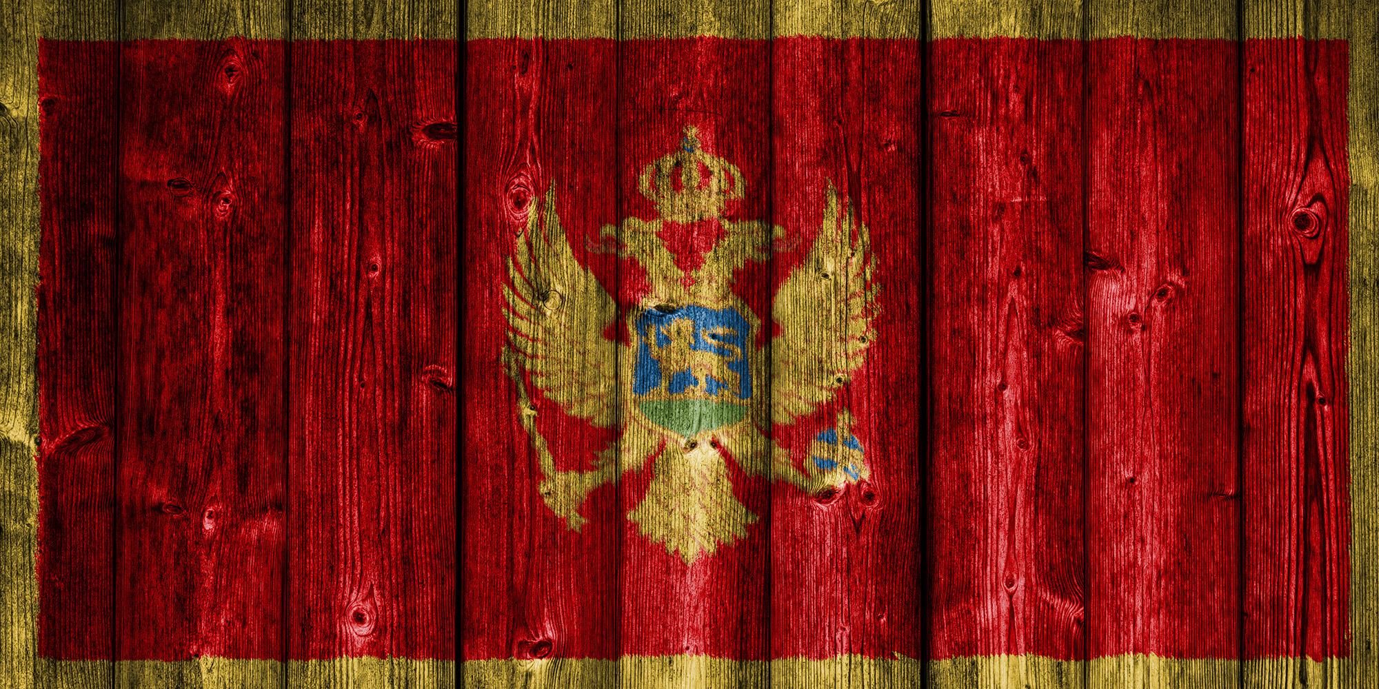 2000x1000 Flag of Montenegro on wood