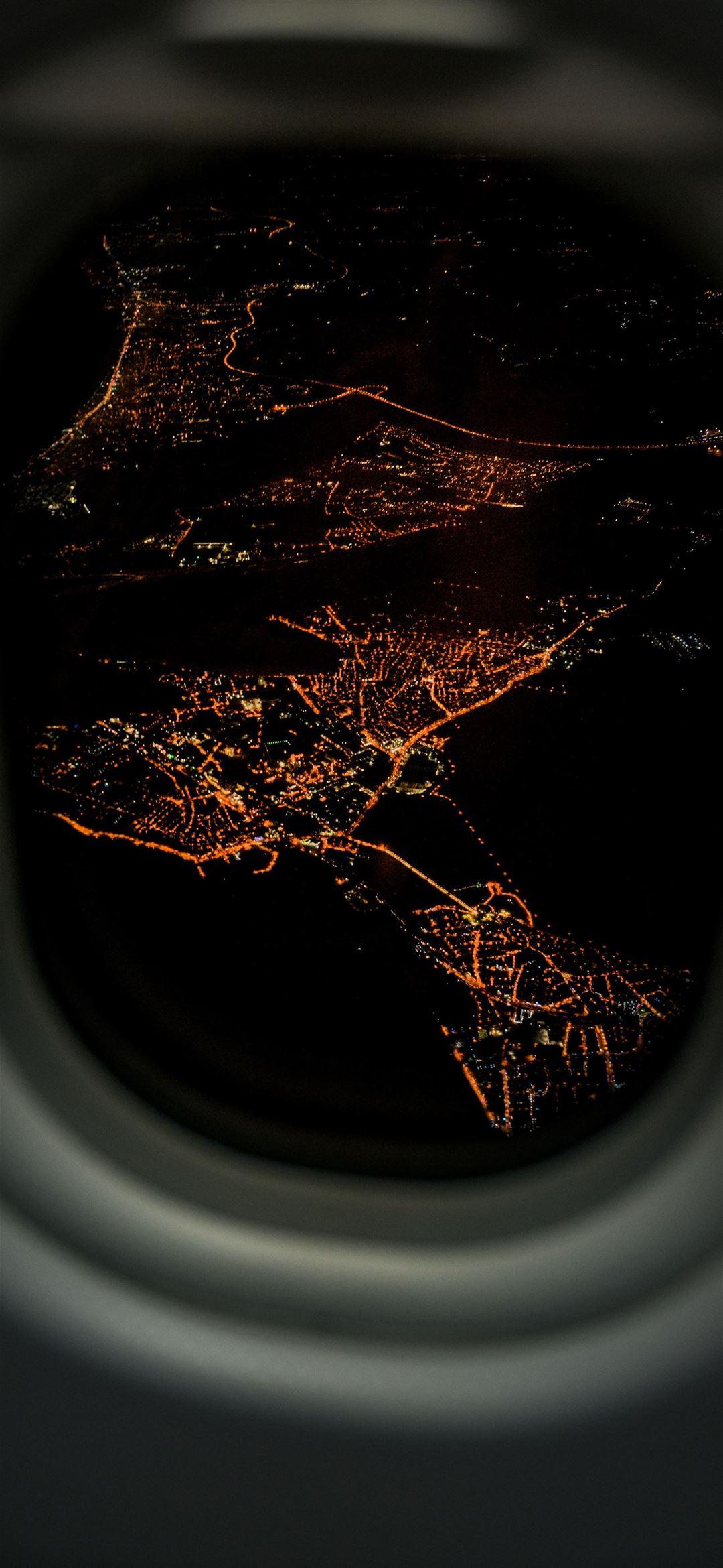 1080x2340 lighted city airplane view iPhone 12 Wallpaper Free Download