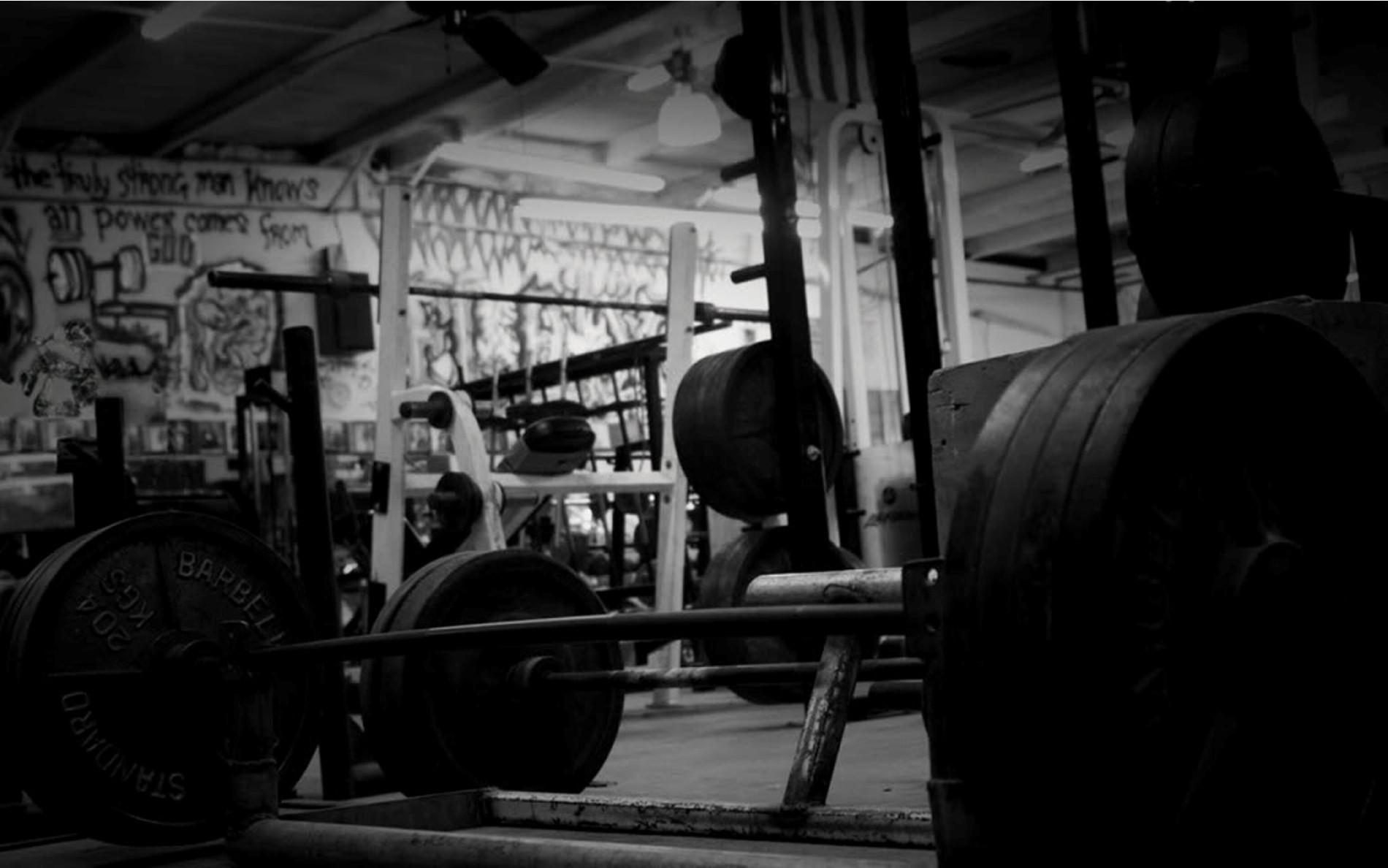 1900x1188 Powerful Gym Vibes: High Definition Sports Workout Wallpaperx1188