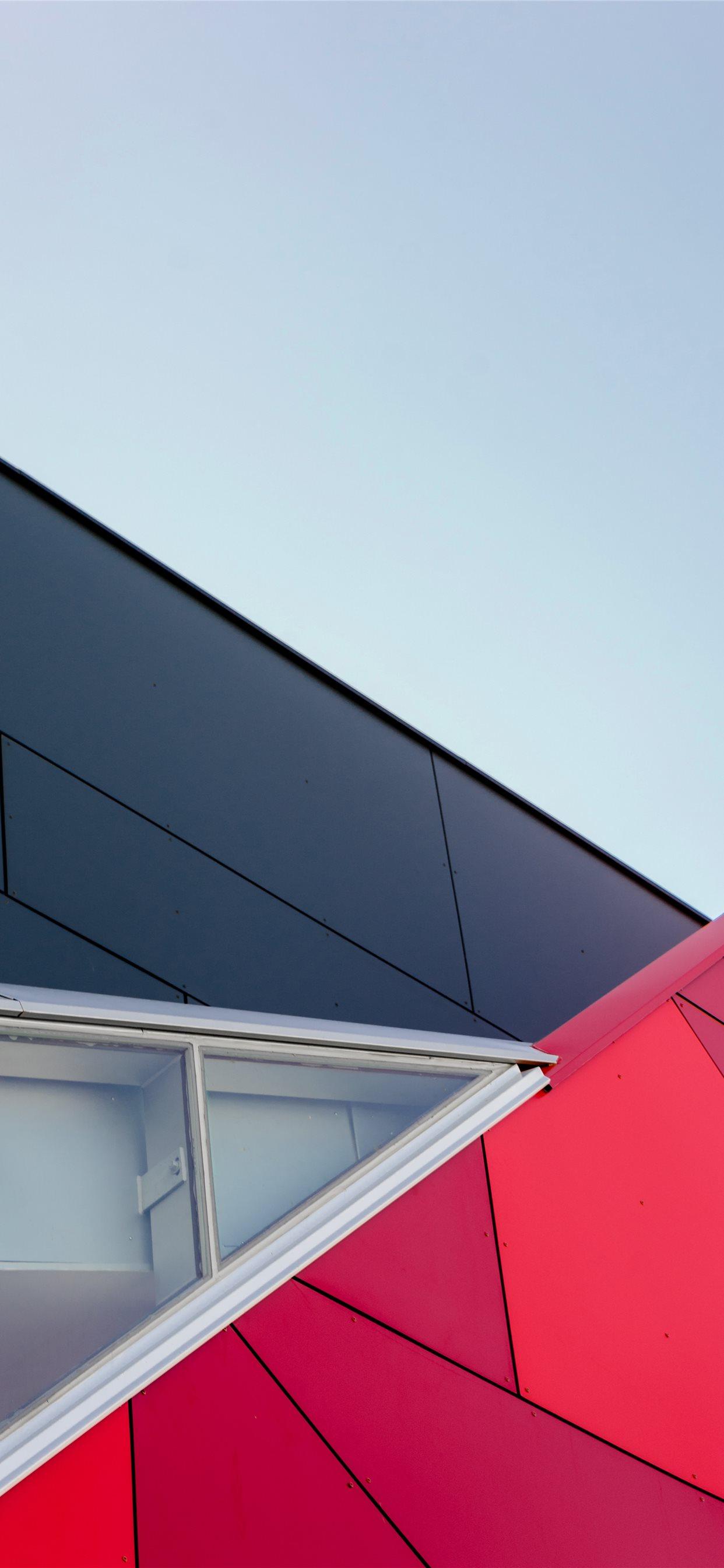 1242x2688 closeup photo of black and red building iPhone X Wallpaper Free Download