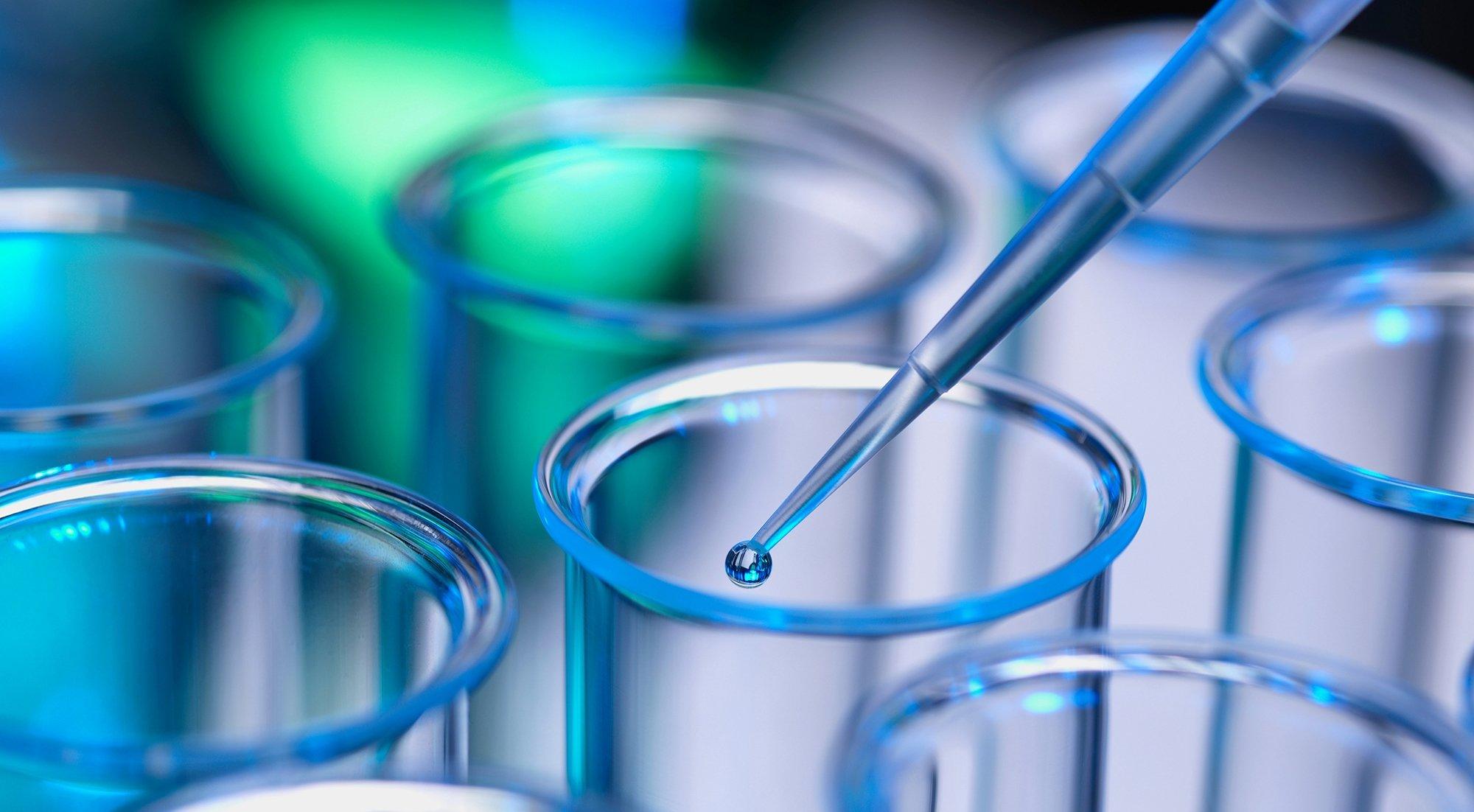 2000x1102 Test tube abstract abstraction cylinder tubes glass bokek medical vials chemistry biology science wallpaperx1102