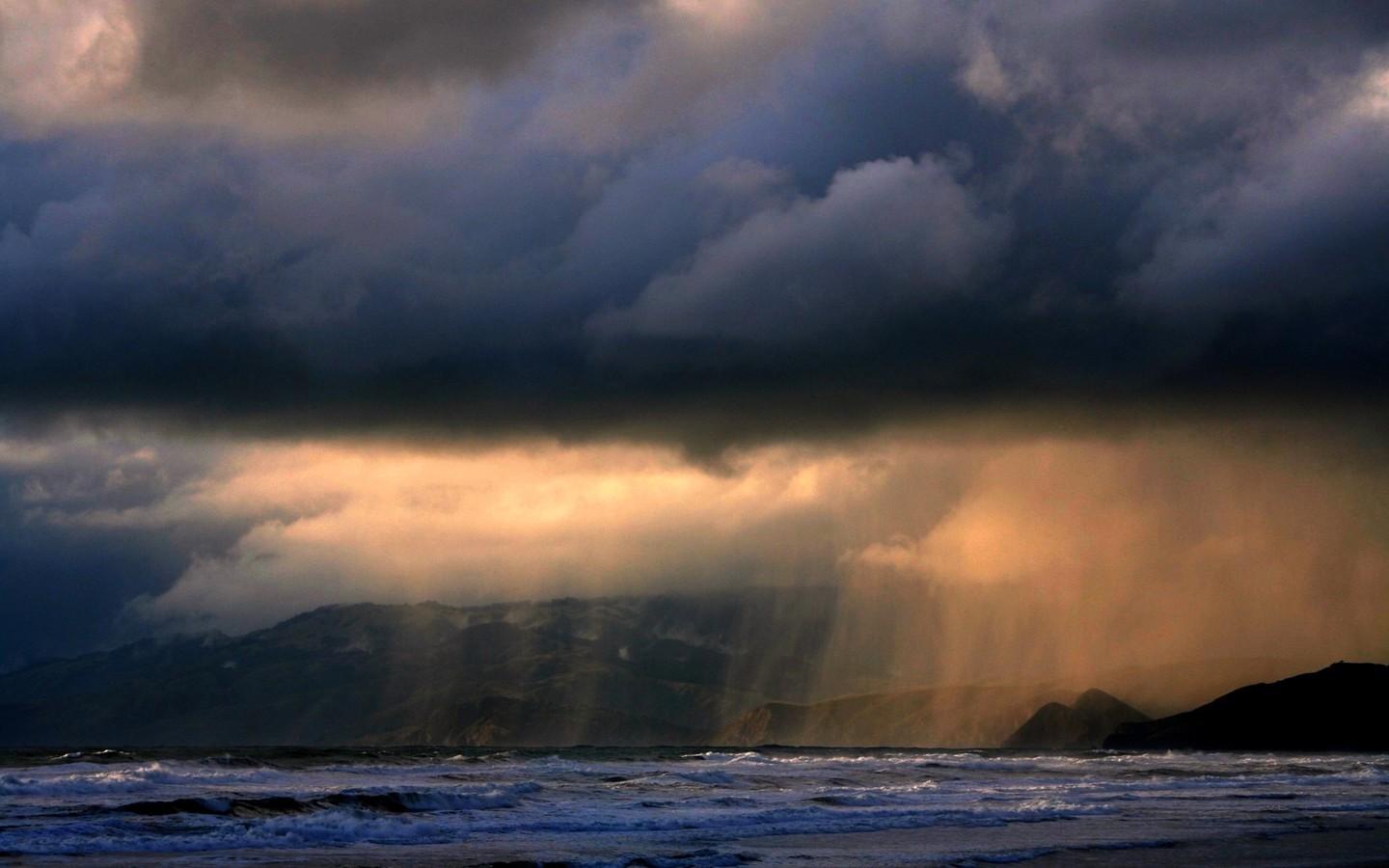 1440x900 Ocean beach rain wallpaperx900