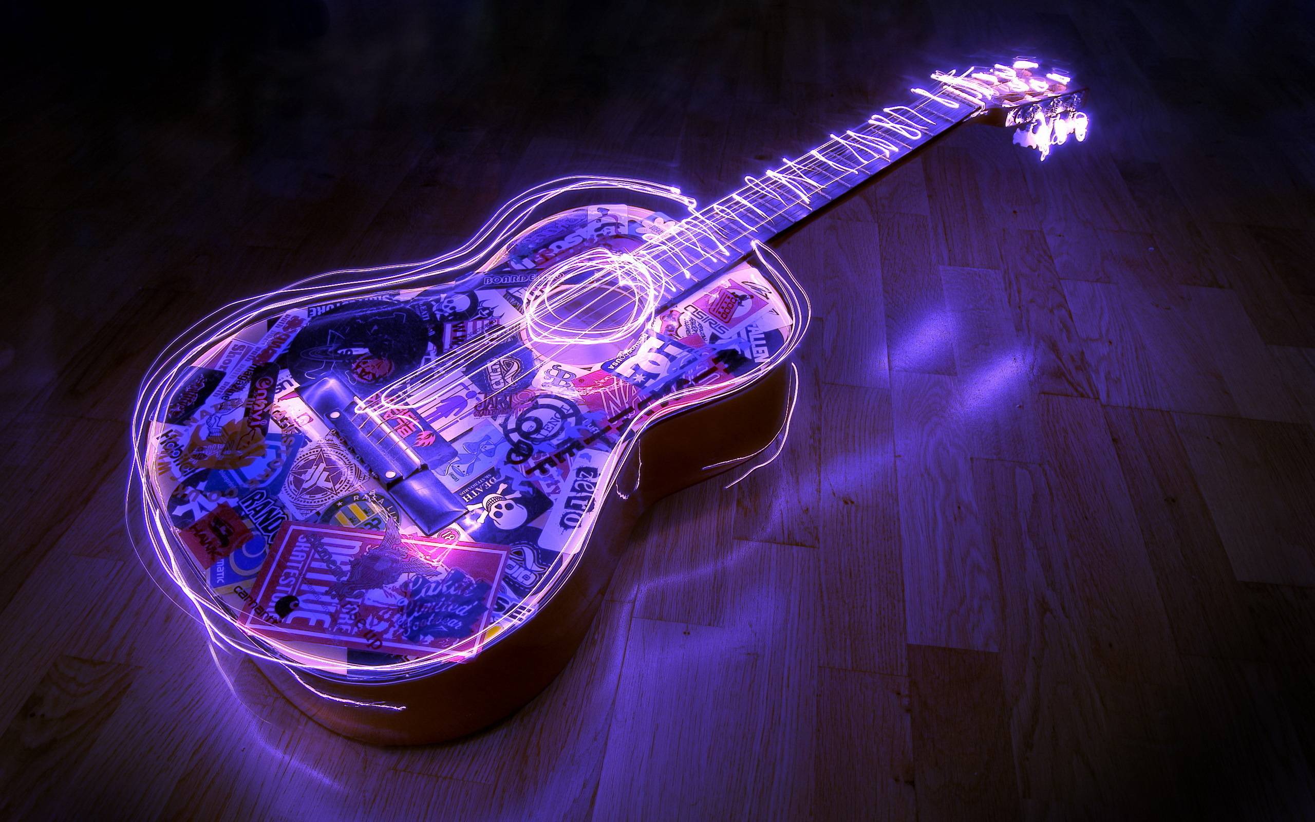 2560x1600 Glowing guitar Desktop wallpaper 1600x900