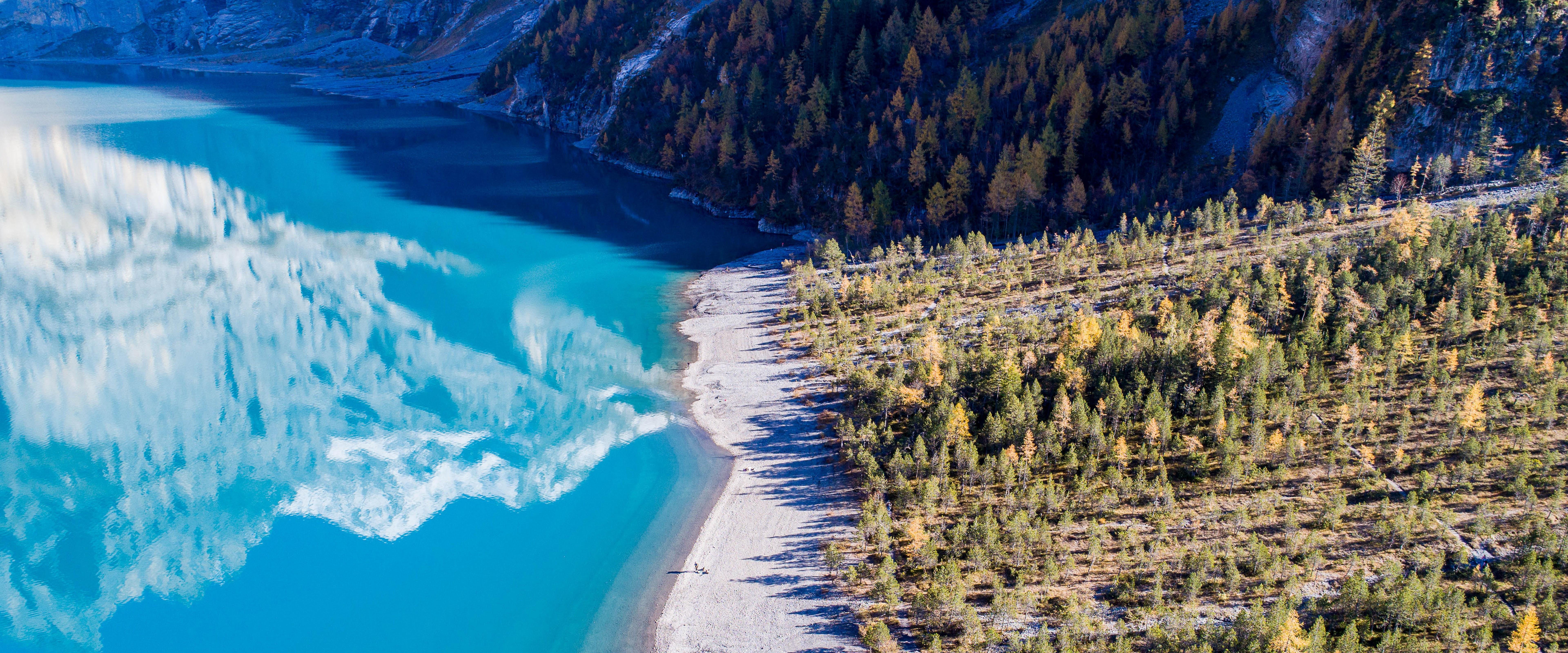 7680x3200 Switzerland Oeschinen Lake Scenery Nature 4K Wallpaper