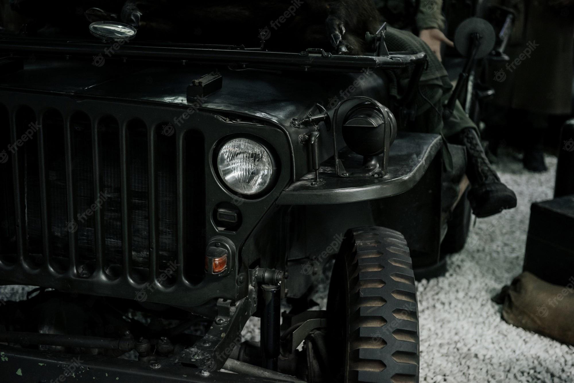 2000x1335 Premium Photo. Military black jeep on the exhibition