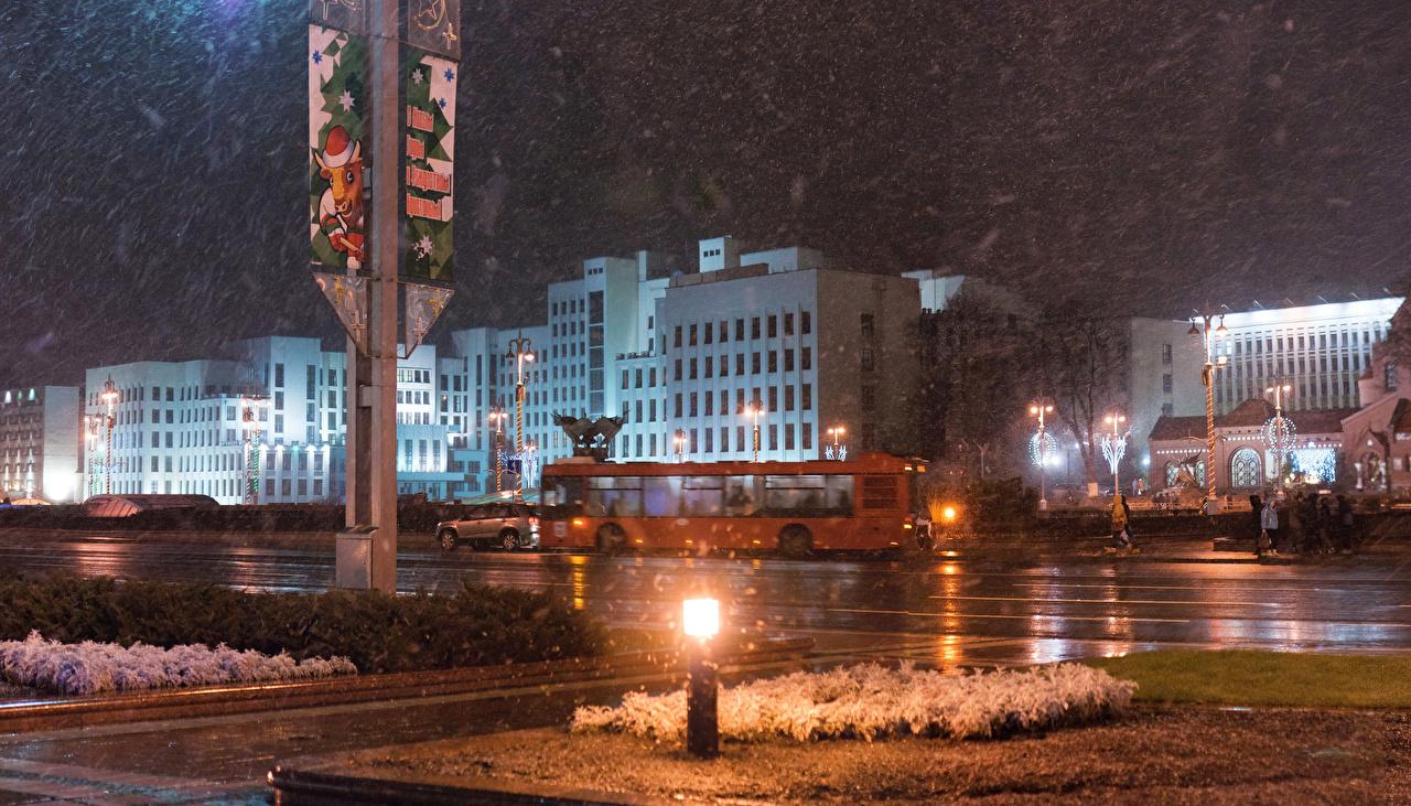1280x731 Picture Belarus Minsk Winter Snow Street Night Street lights Houses