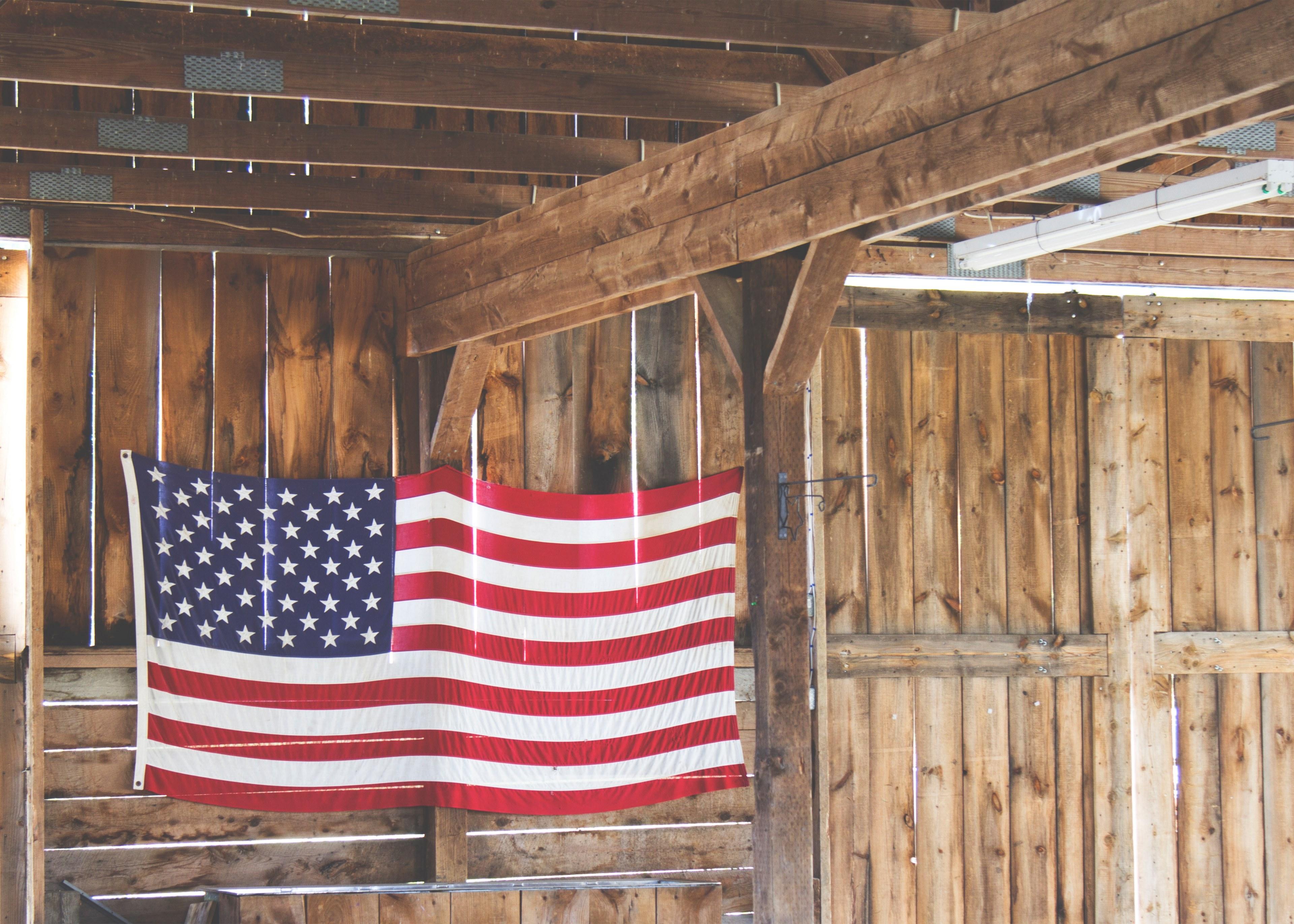 3840x2743 Wallpaper / an american flag hanging in a wooden barn, american flag in a barn 4k wallpaper free download