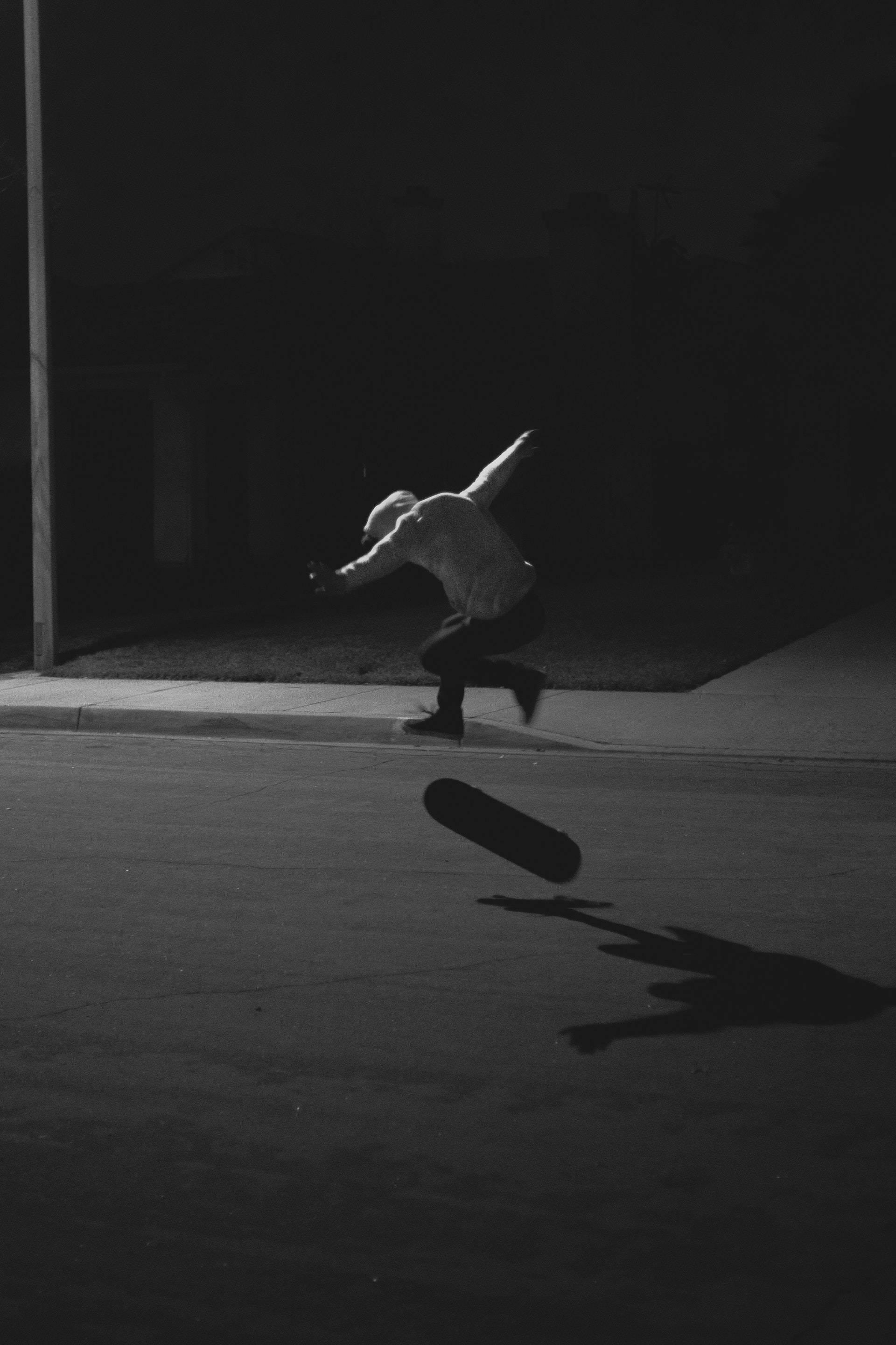 1920x2880 Download Skater Boy In The Dark Wallpaper